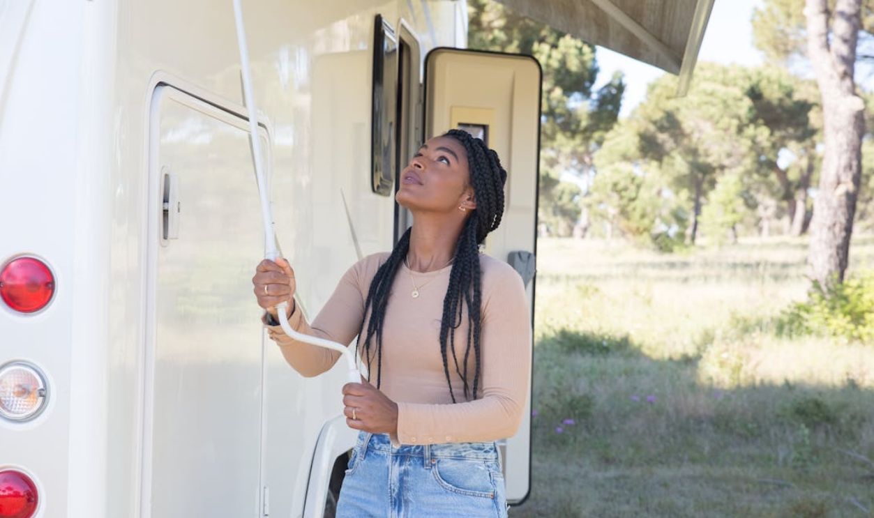 A Woman in Brown Long Sleeve Shirt