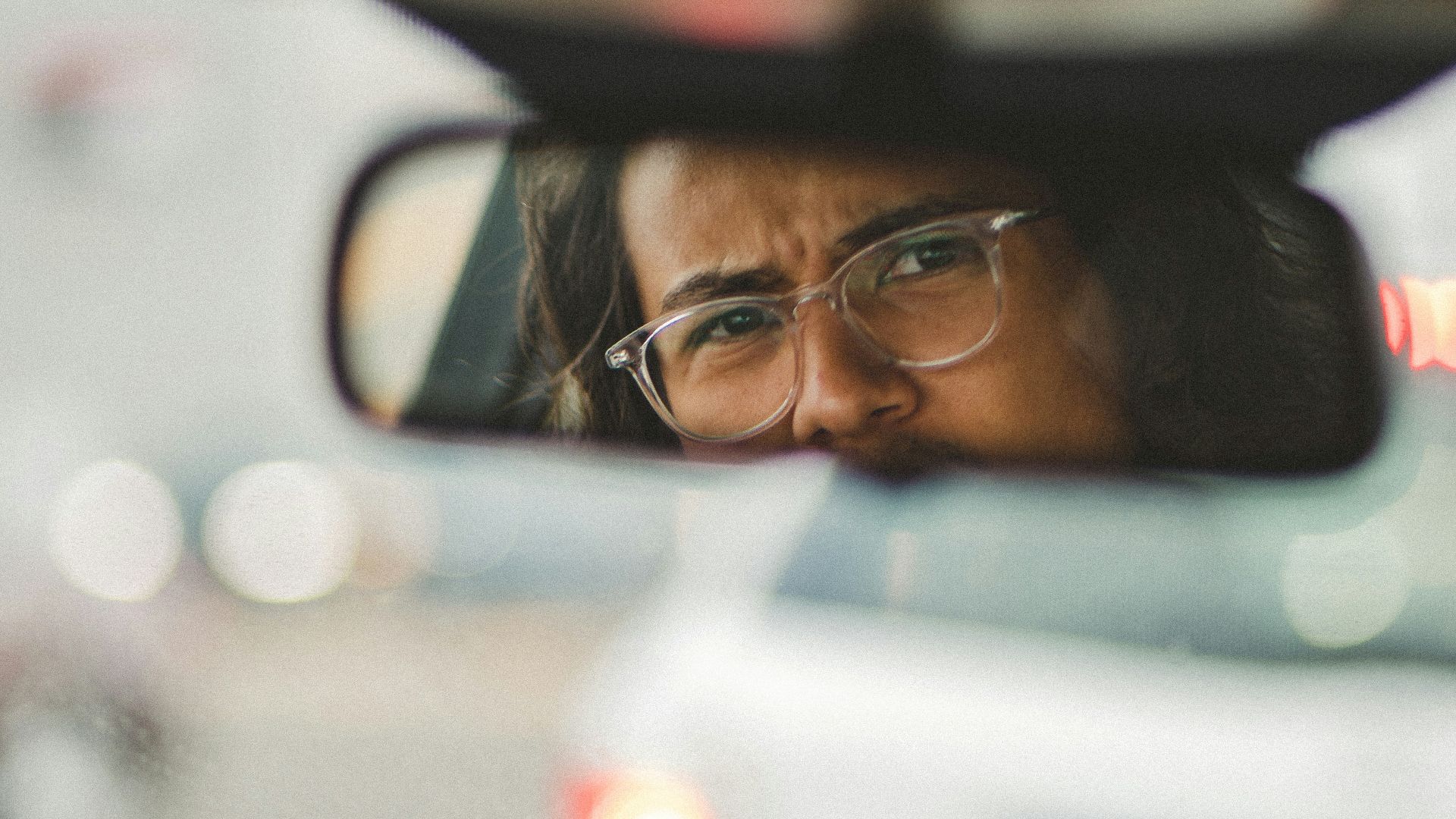 man in black framed eyeglasses