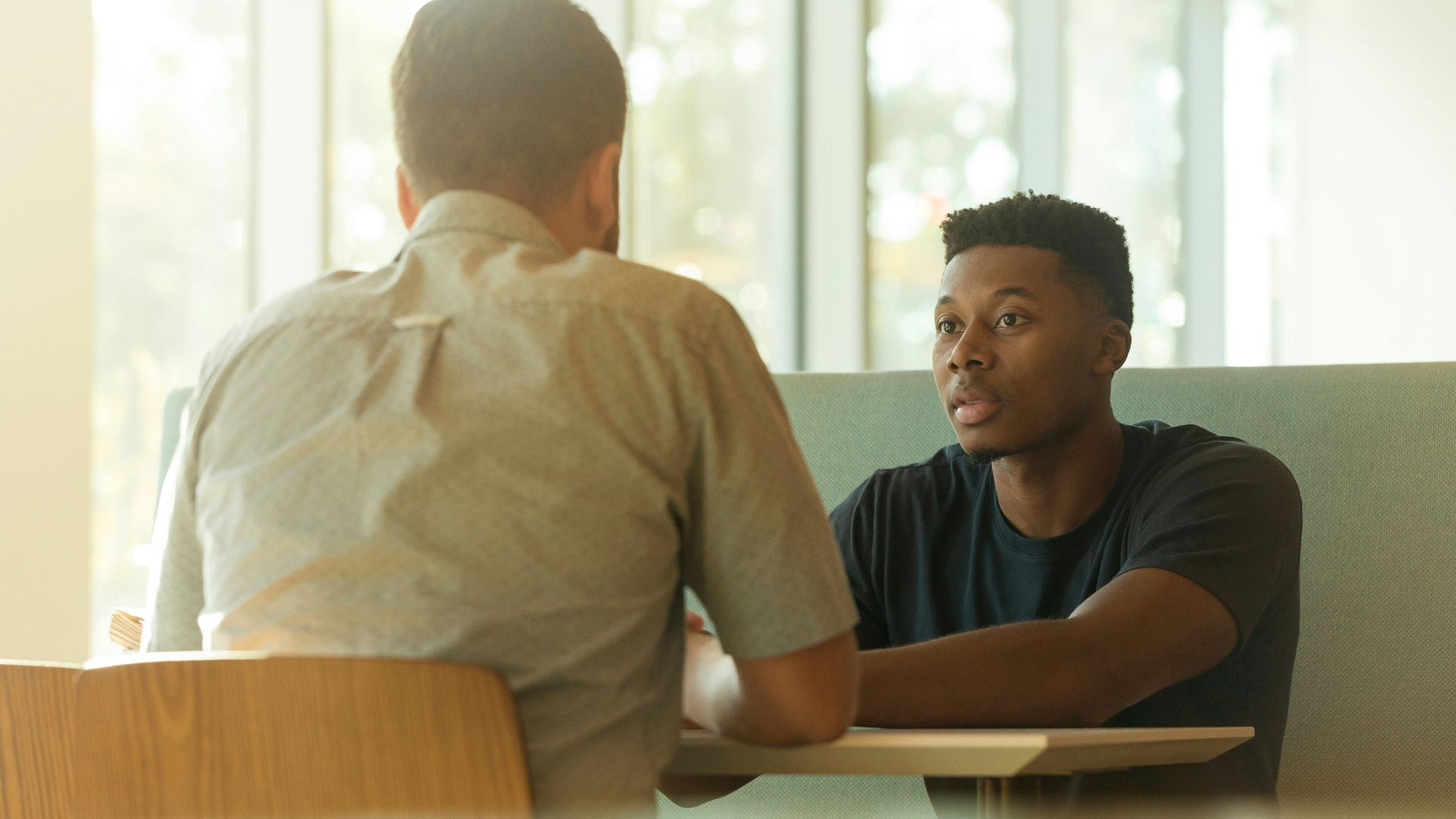 two men talking