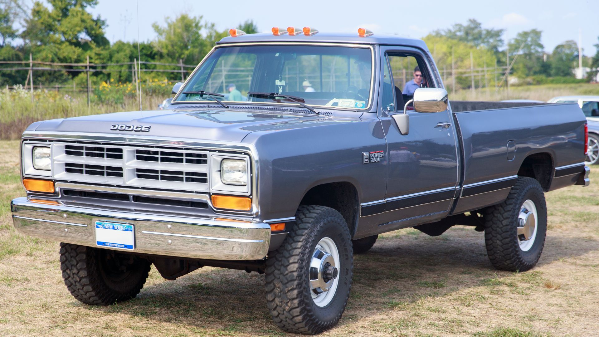 1989 Dodge Power Ram W250 Sweptline (4WD) seen at a Cars & Coffee in Bridgehampton, NY. Standard Cab 3/4-ton truck fitted with the new-for-1989 5.9-liter Cummins diesel engine (which was in short supply until 1991) and built in Warren, MI.