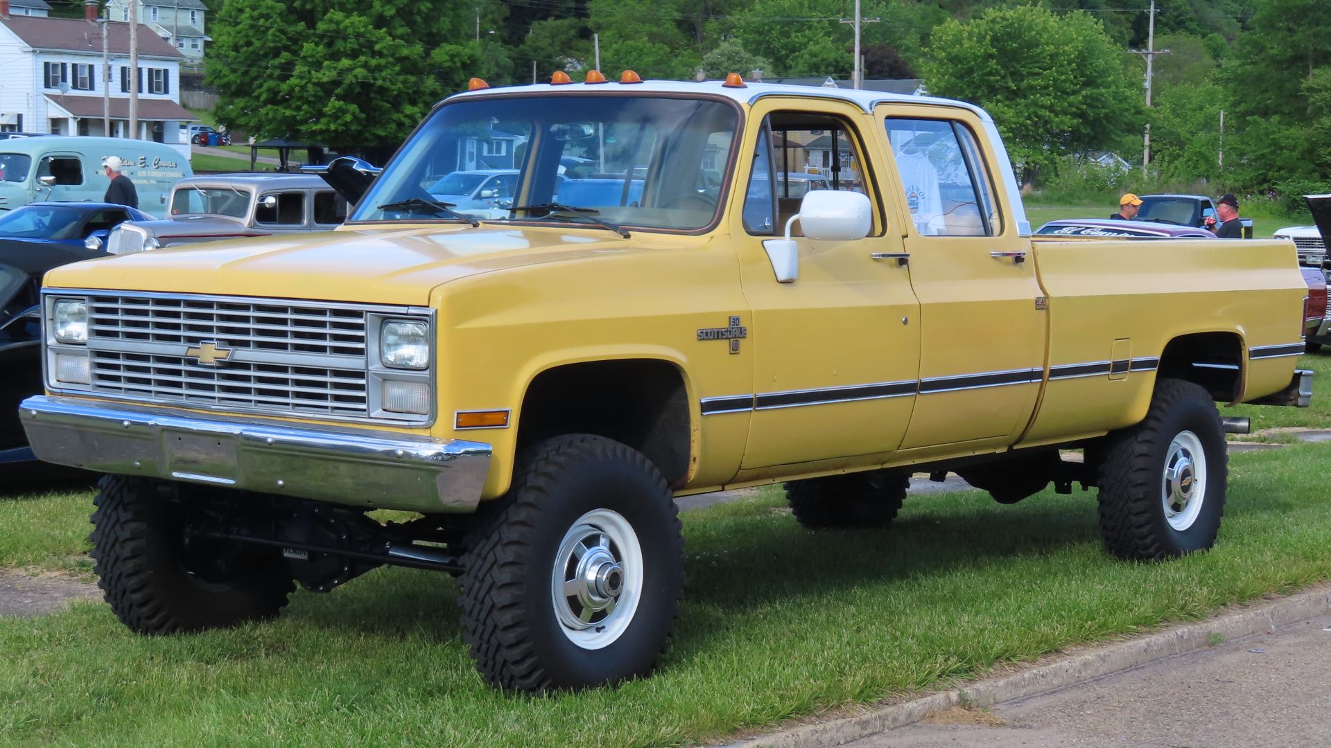 1984 Chevrolet K30 Scottsdale crew cab photographed at a car cruise in Lowellville, Ohio. Finished in Colonial Yellow.