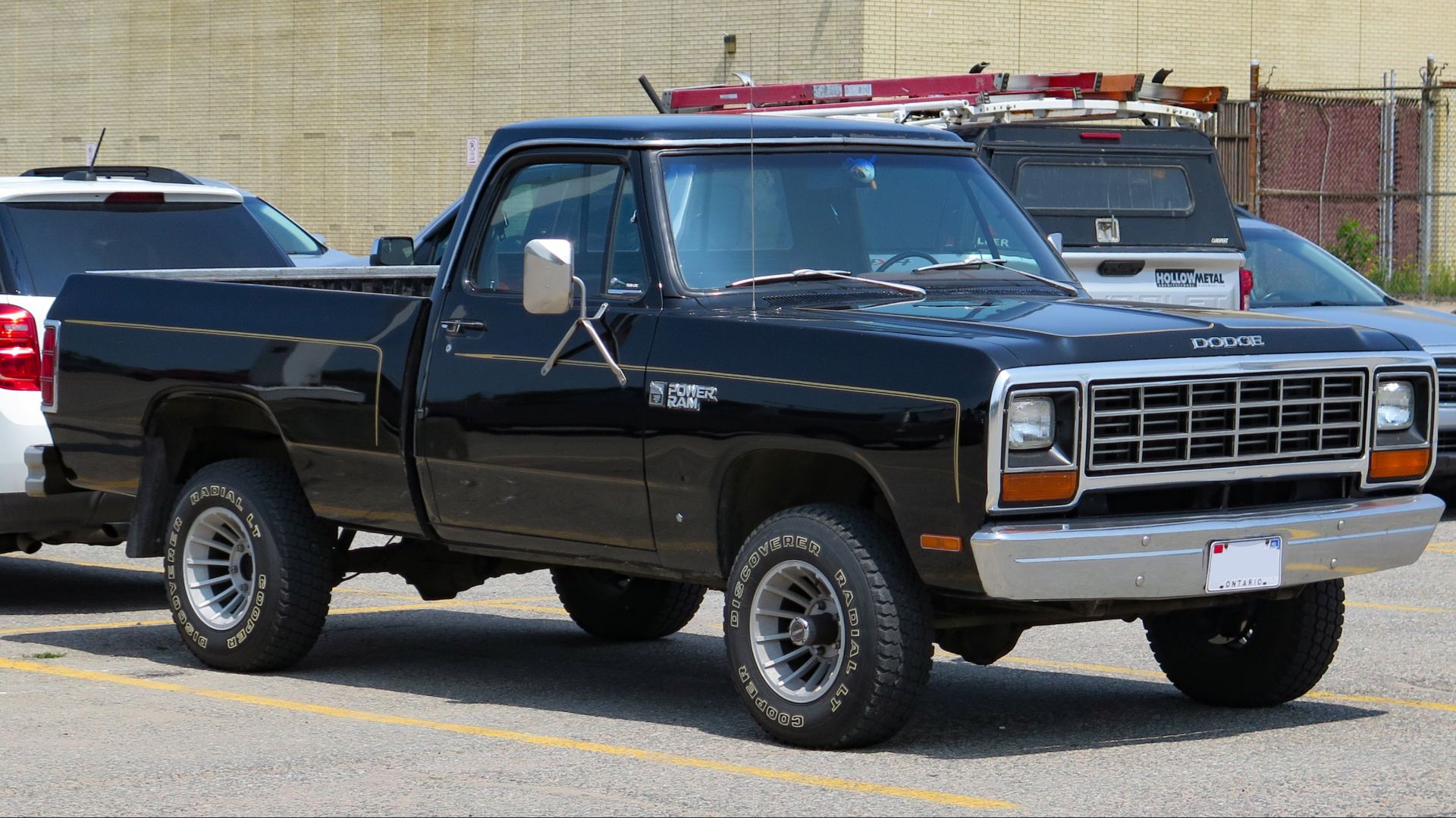 1981 Dodge W150 Power Ram Royal SE Conventional Cab photographed in spectator parking at the 2023 Sault Ste. Marie Queen Street Cruise in Sault Ste. Marie, Ontario, Canada.