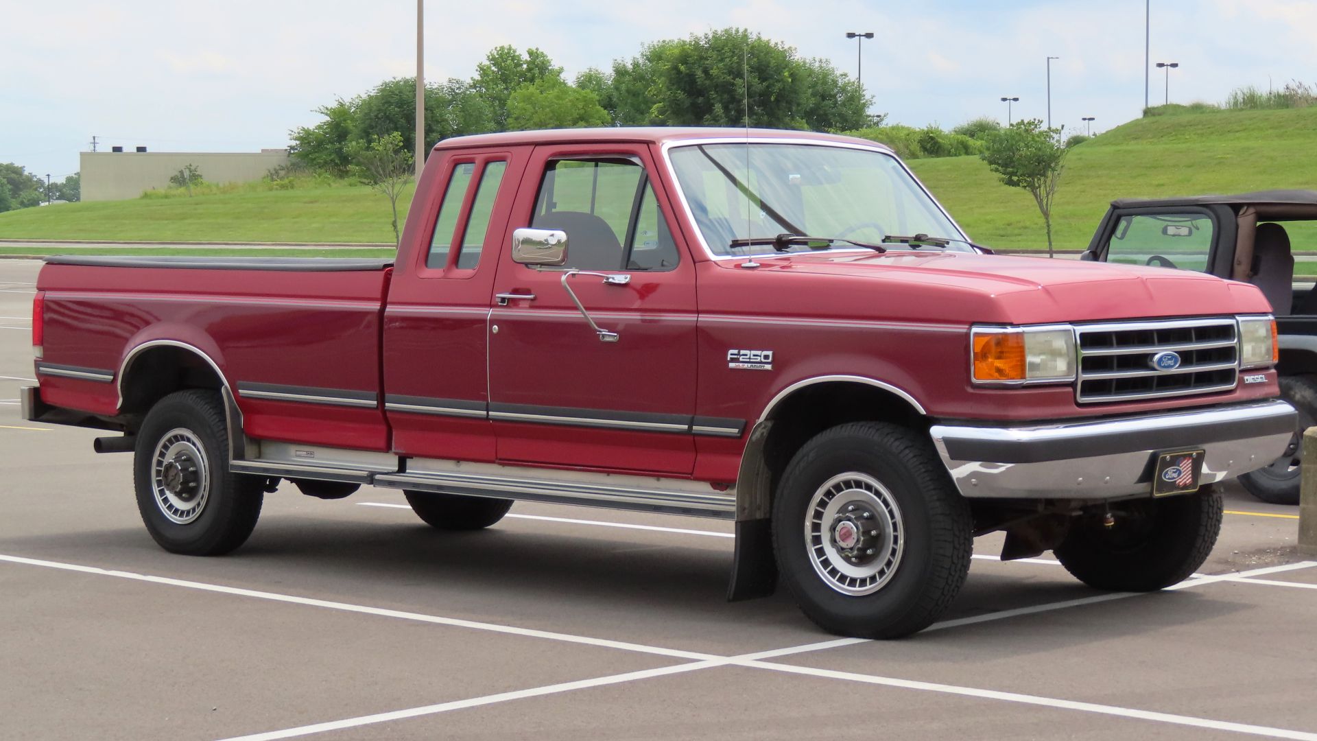 1990 Ford F-250 XLT Lariat SuperCab 4x4 photographed in New Castle, Pennsylvania. Finished in what I believe is Scarlet Red over Medium Cabernet. This one has an 8' box and the 7.3 liter diesel V8.