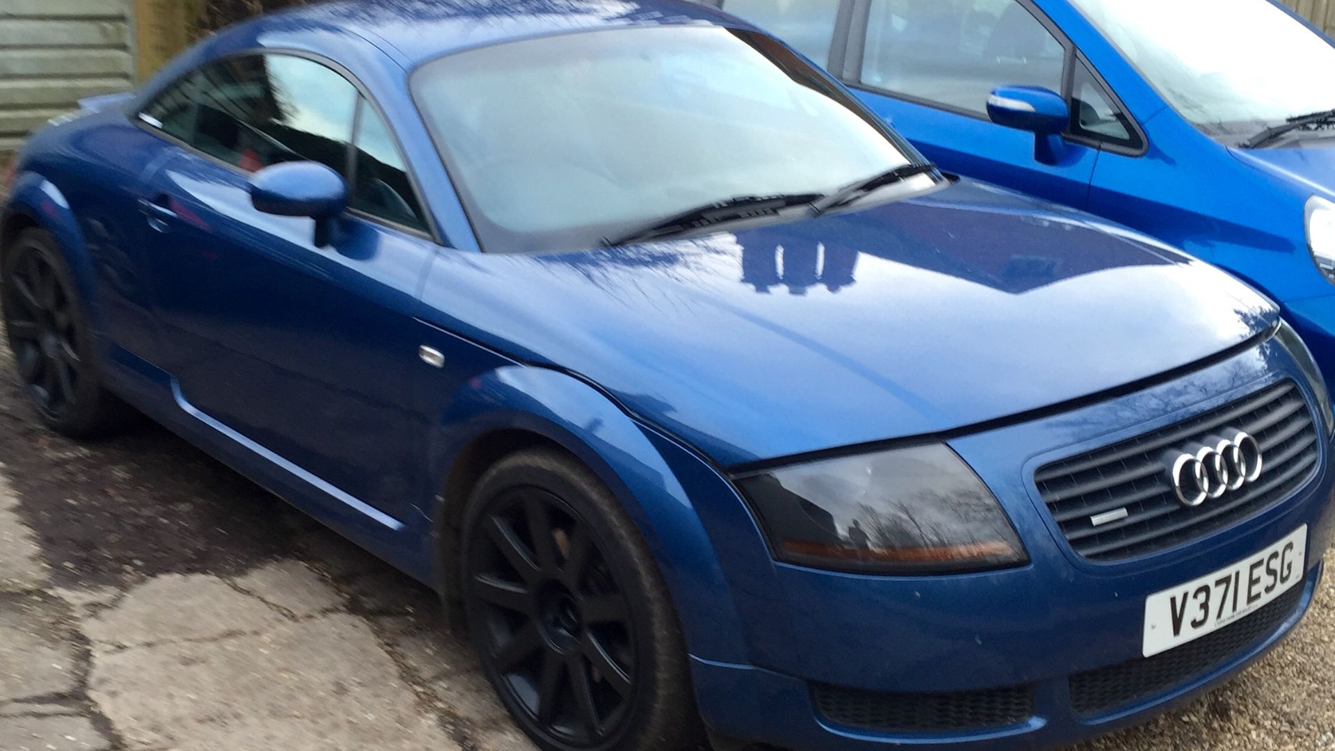 Photo of a mk1 Audi TT, V reg, in jean blue.