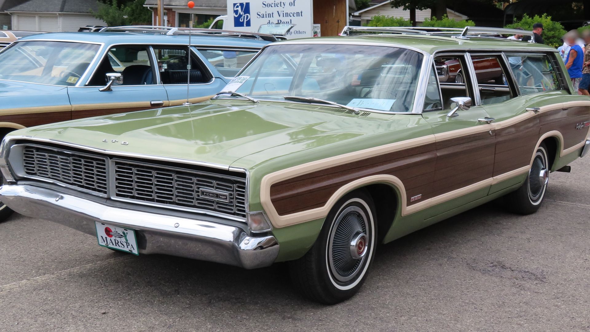1968 Ford Country Squire photographed at the July 15, 2023 International Station Wagon Club meet in Butler, Pennsylvania. Finished in Lime Gold Poly. Despite the LTD badge on the hood, the Country Squire was not officially part of the LTD range until 1969.