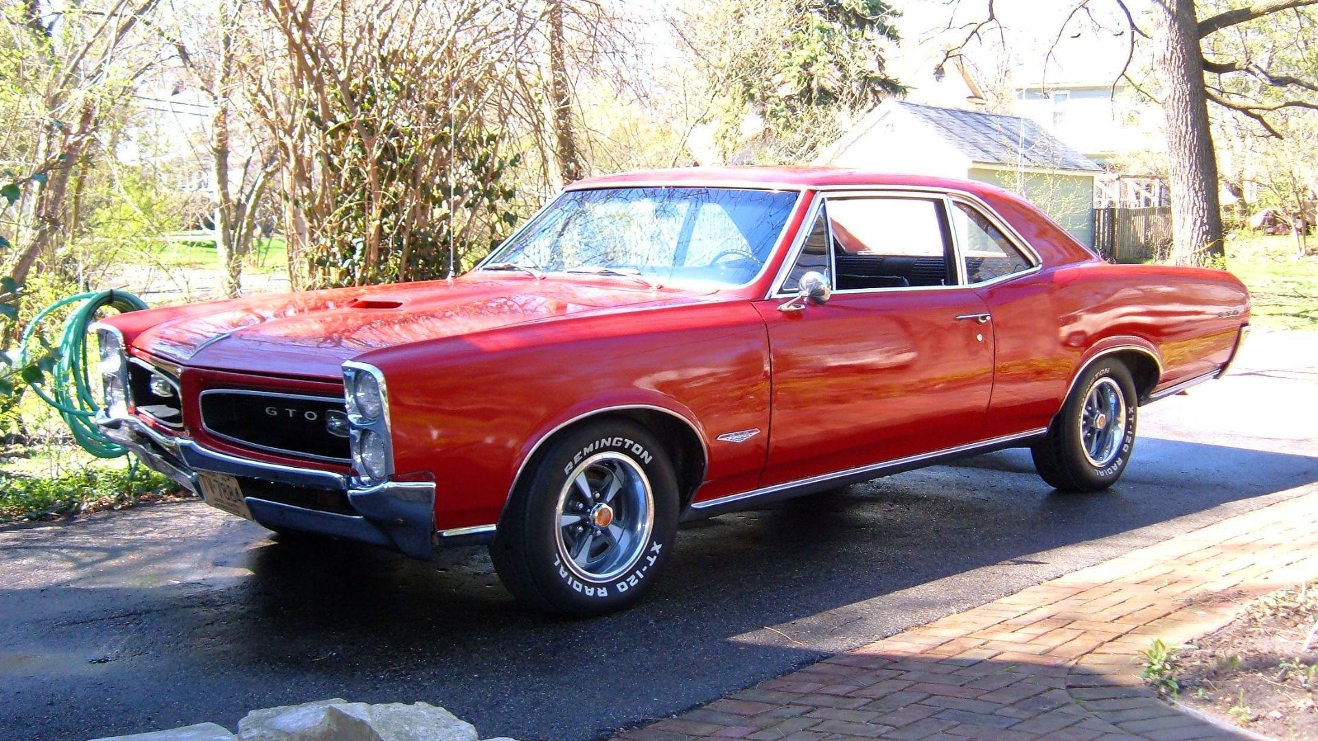 1966 Pontiac GTO coupe owned by Karl S. Freese seen with 1967 Ralley II wheels.