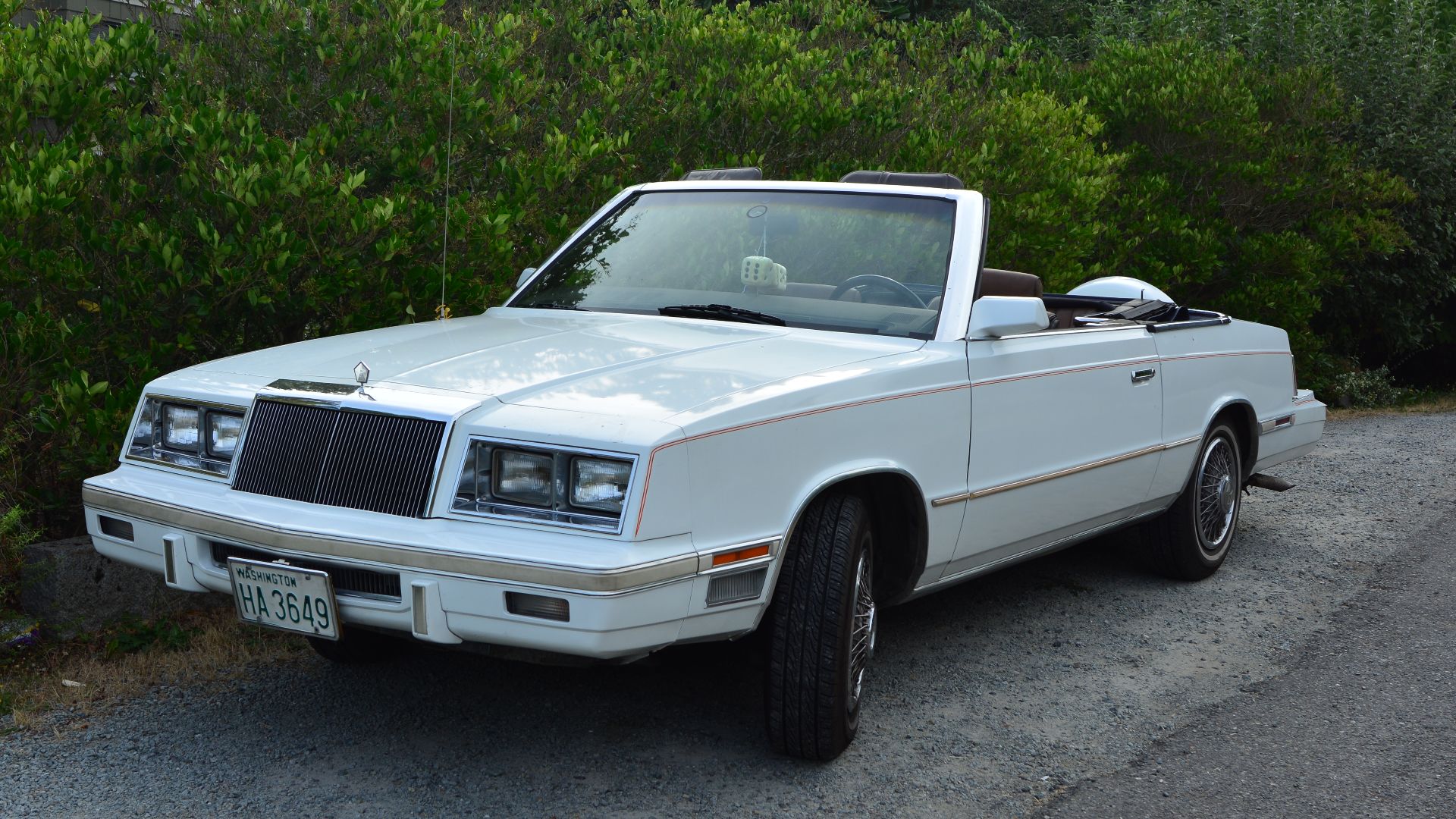 1984 Chrysler LeBaron convertible parked near Frink Park, Seattle, Washington.