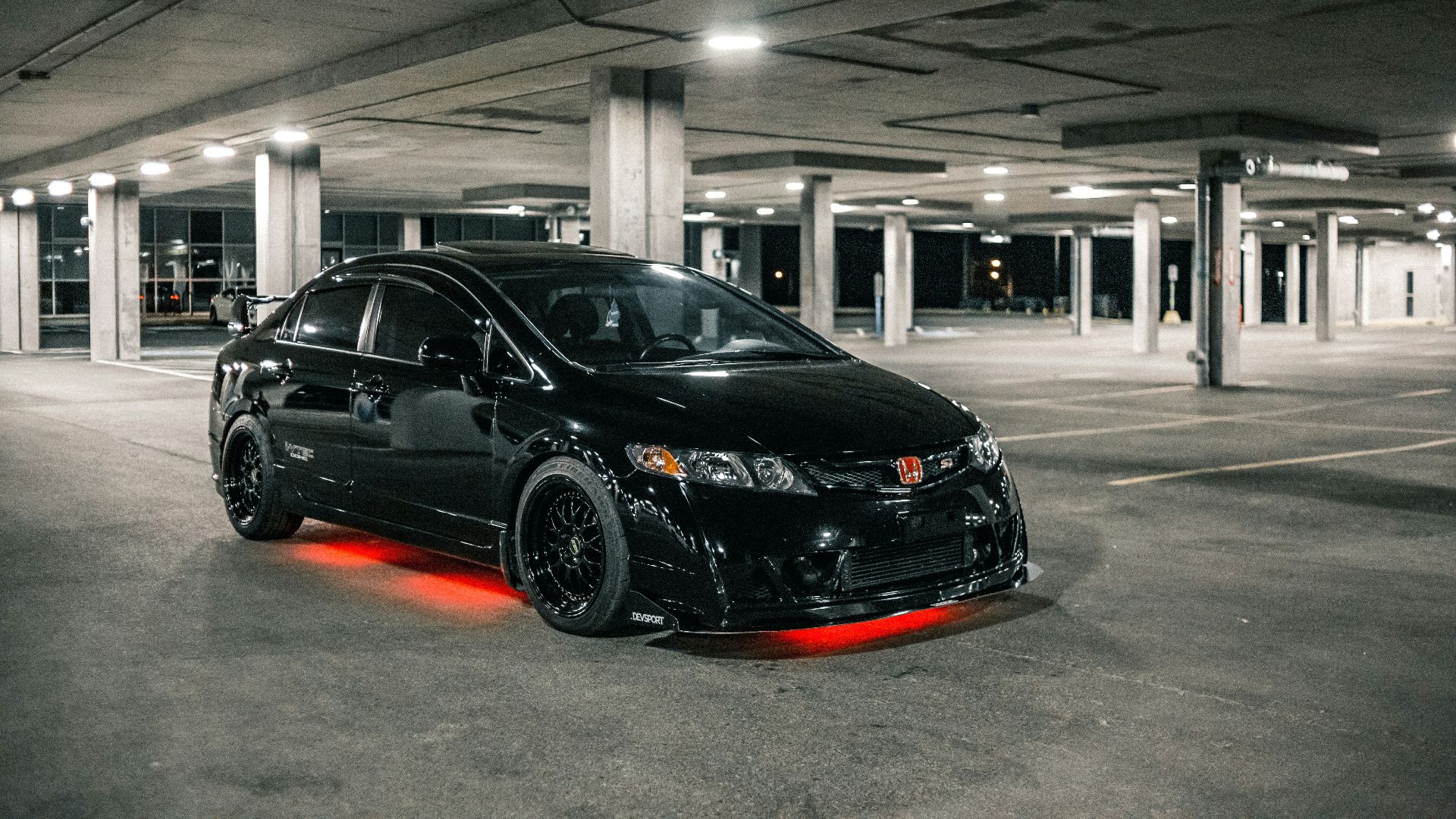 black mercedes benz coupe parked in parking lot