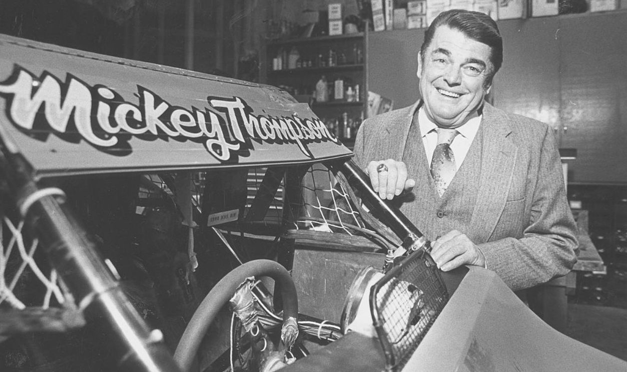 ME.Thompson  FILE PHOTO from SEPT 12 1986  Auto racerpromoter Mickey Thompson stands in his garage by a singleseat offroad racer in September 1986.
