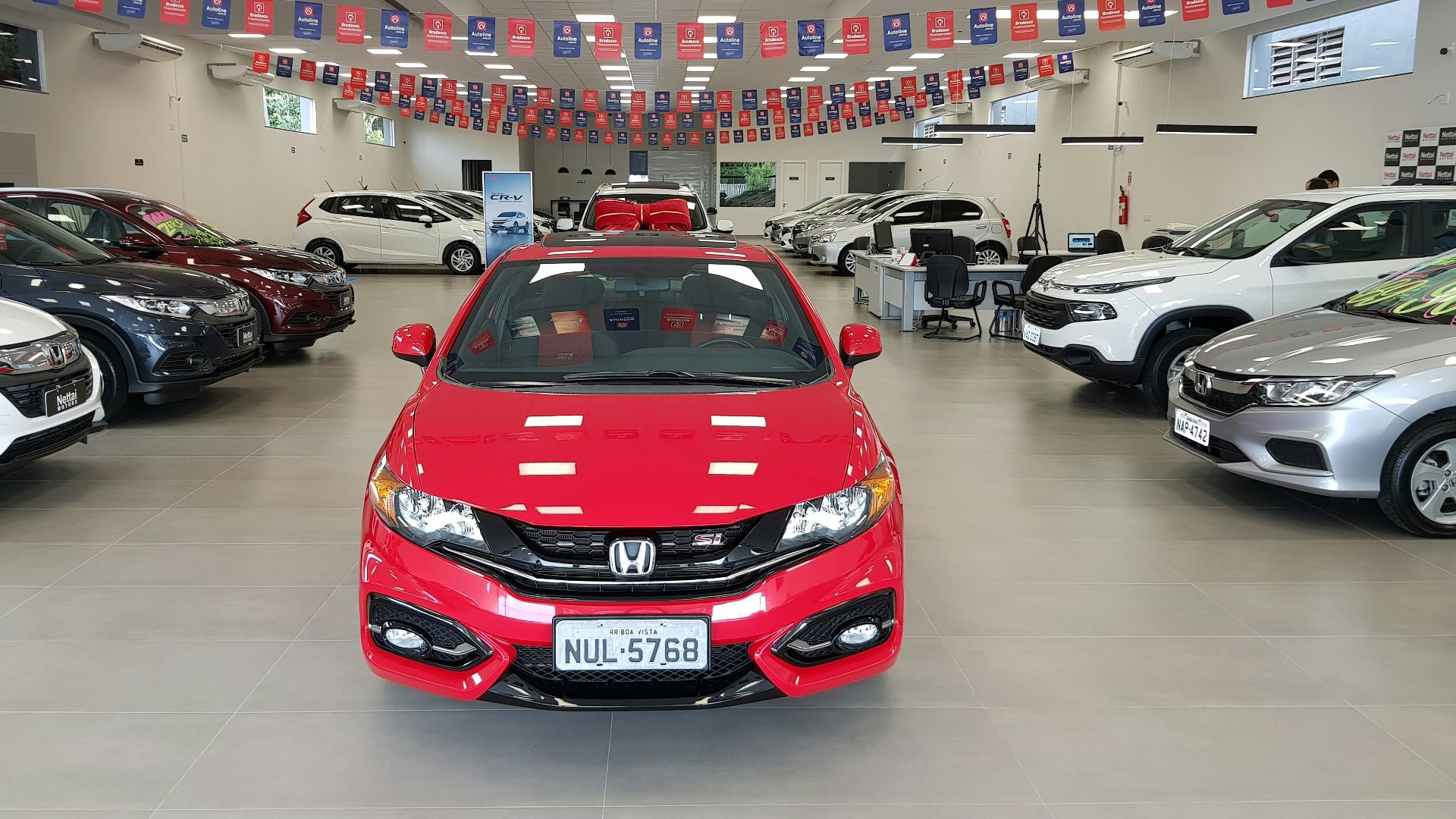 red Honda Civic sedan