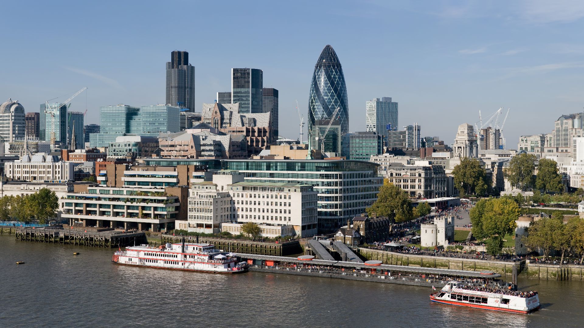 The City of London skyline as viewed toward the north-west from the top floor viewing platform of London City Hall on the southern side of the Thames. In the foreground: Dixie Queen and Millennium Time at Tower Millennium Pier. This is a 5 segment panoramic image taken by myself with a Canon 5D and 24-105mm f/4L IS lens.