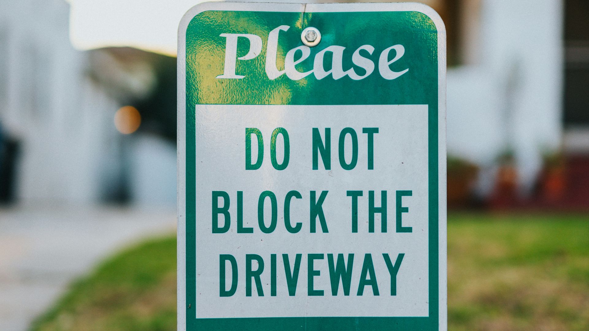 white and green street sign