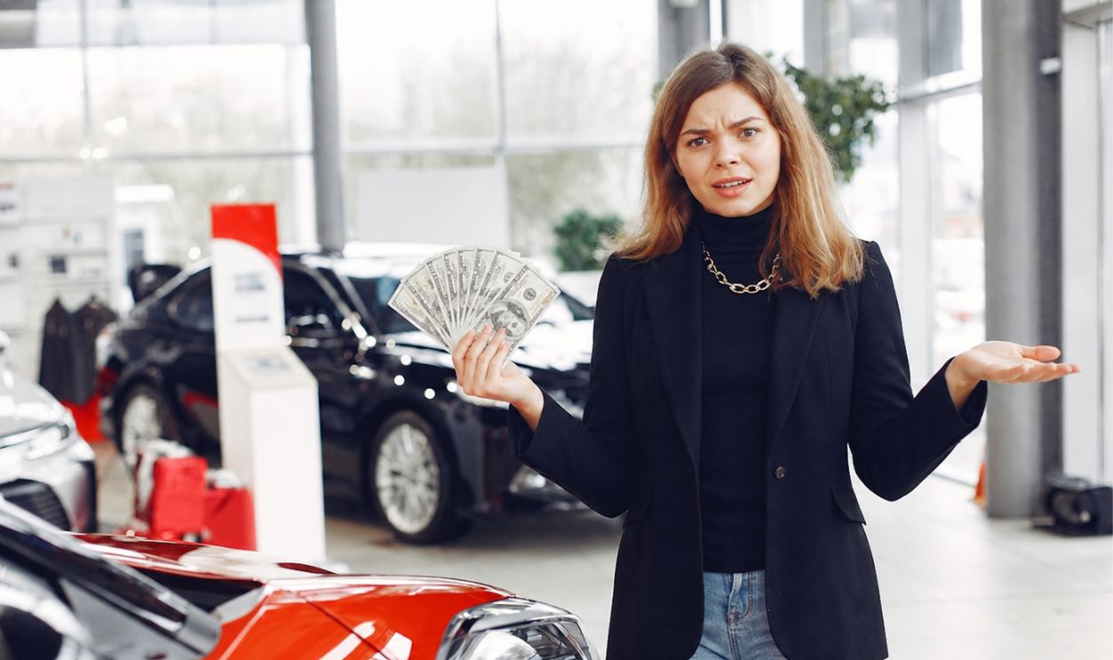 Confused woman buying car 
