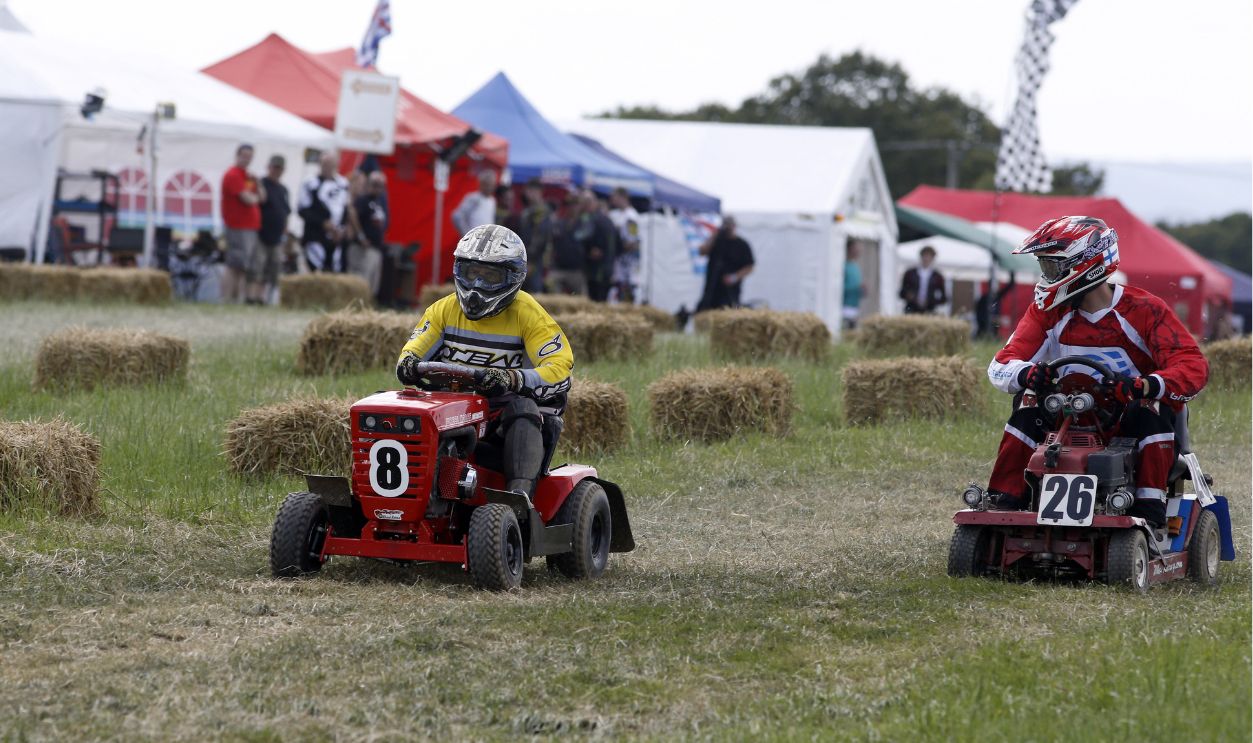 Competitors practice and qualify ahead of the British Lawn Mower Racing Association 12 hour British Lawn mower race near Billingshurst, Sussex. 