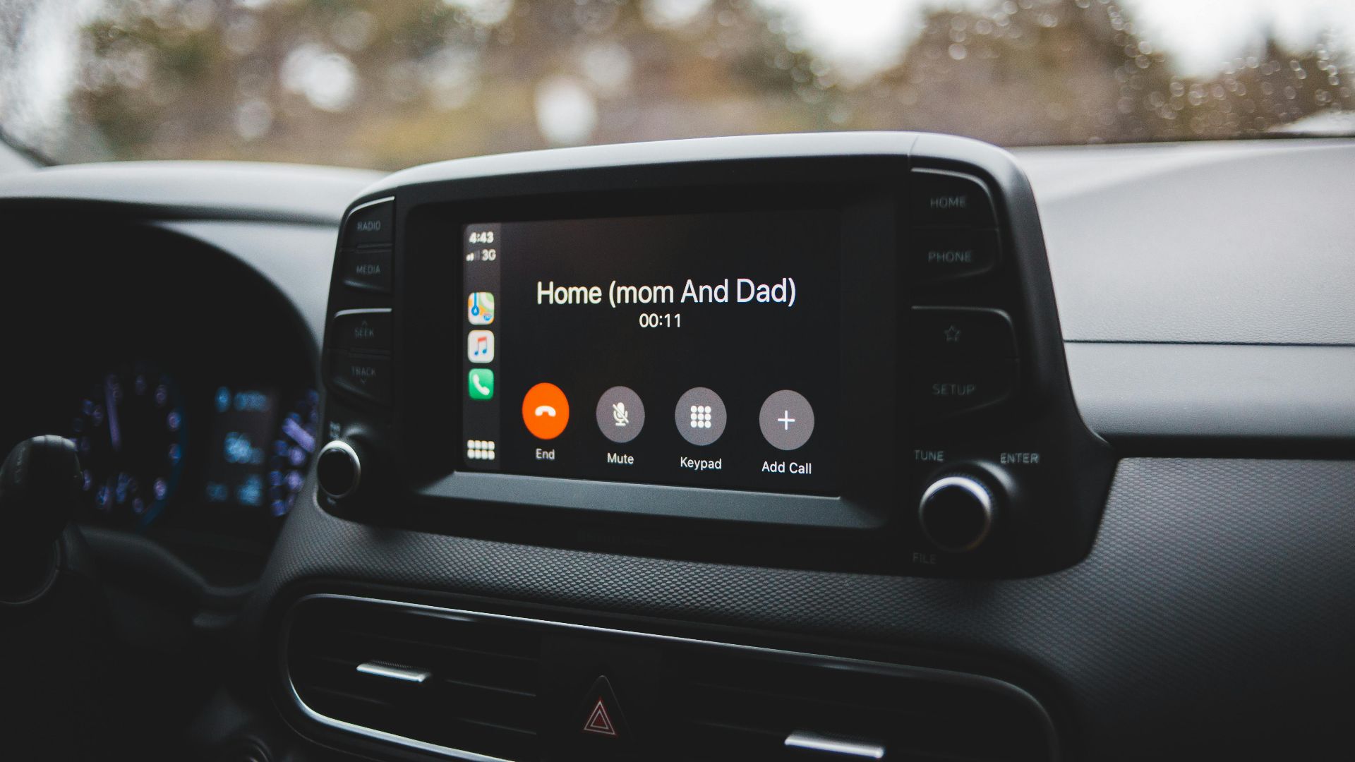 Screen of modern multimedia system in car with hand free call to home