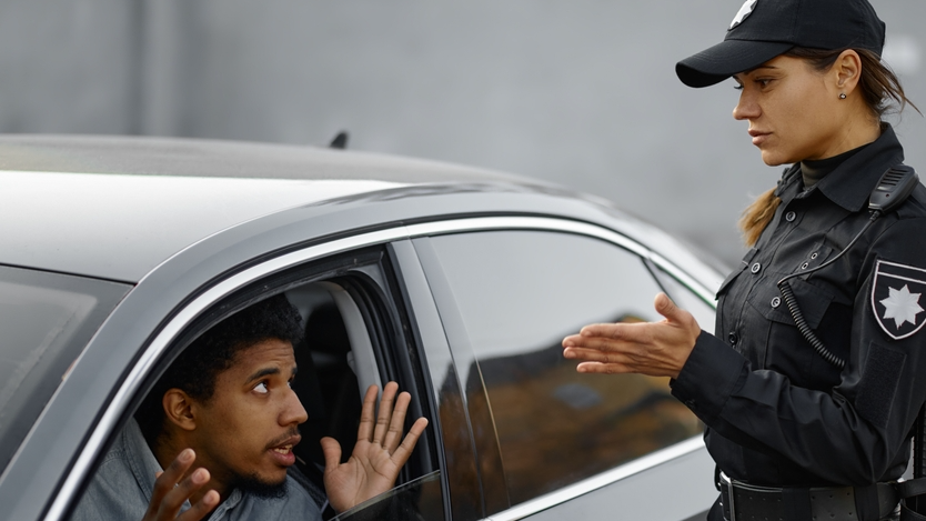 Car driver arguing with traffic police woman
