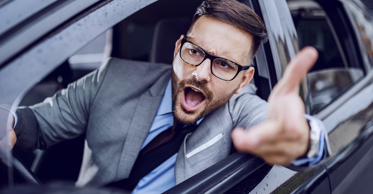 Angry businessman with road rage.