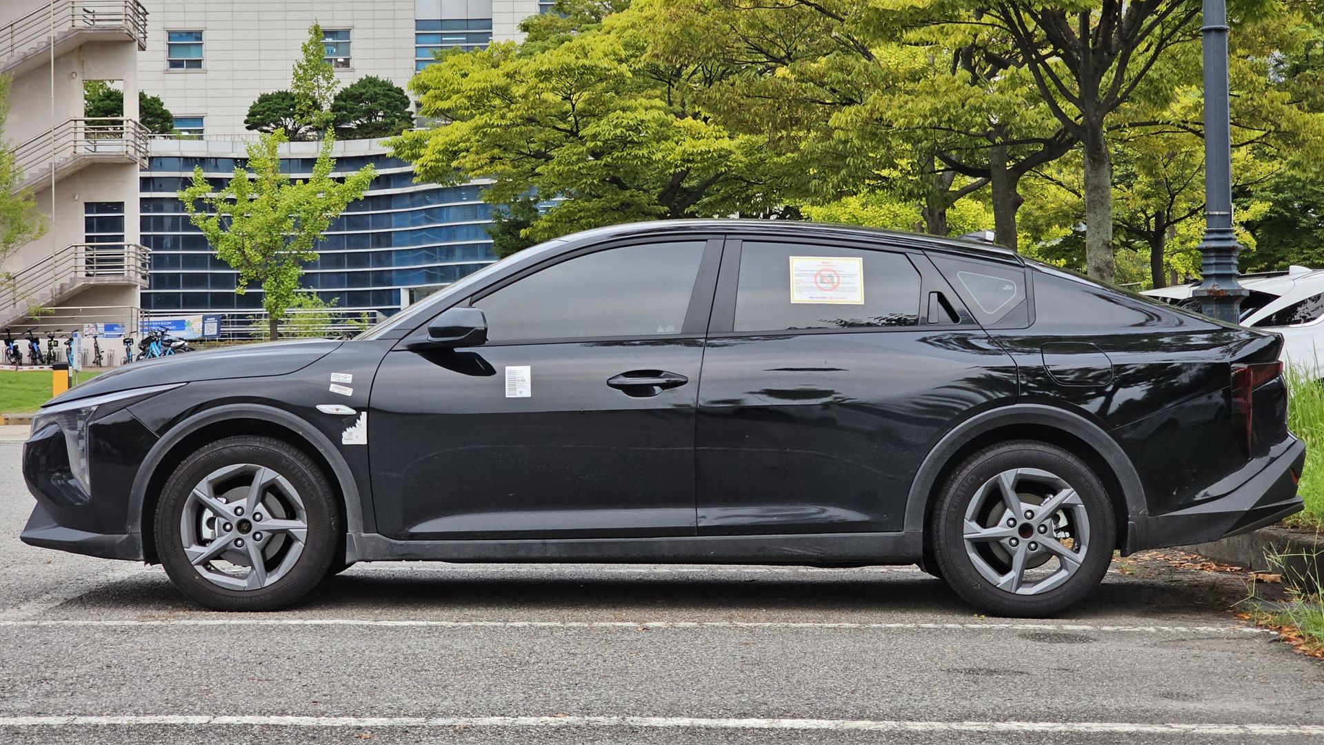 Aurora Black Pearl Kia K4 LXS sedan CL4 Test Vehicle.