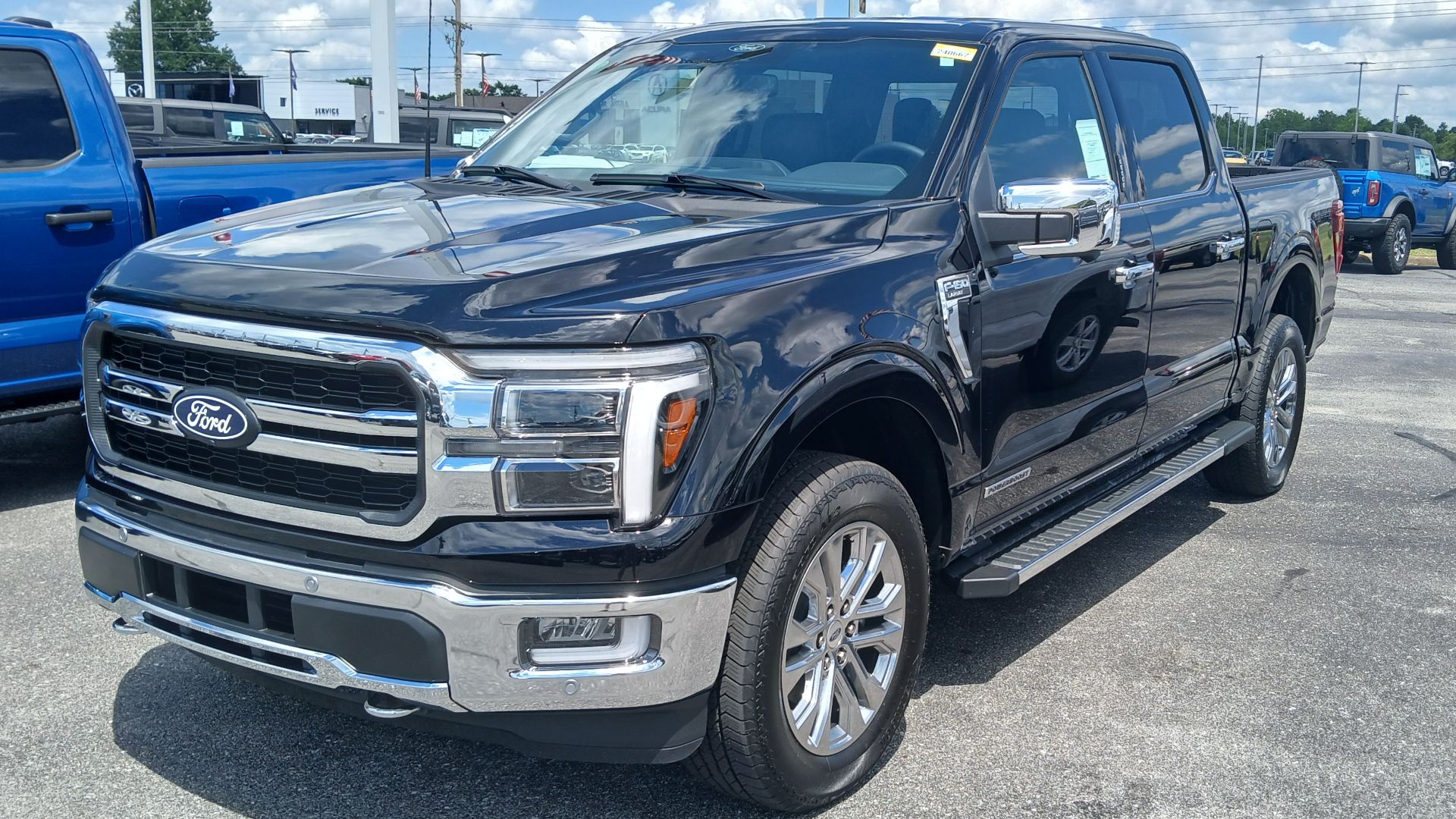 Front view of a 2024 Ford F-150 Lariat SuperCrew PowerBoost pickup truck.