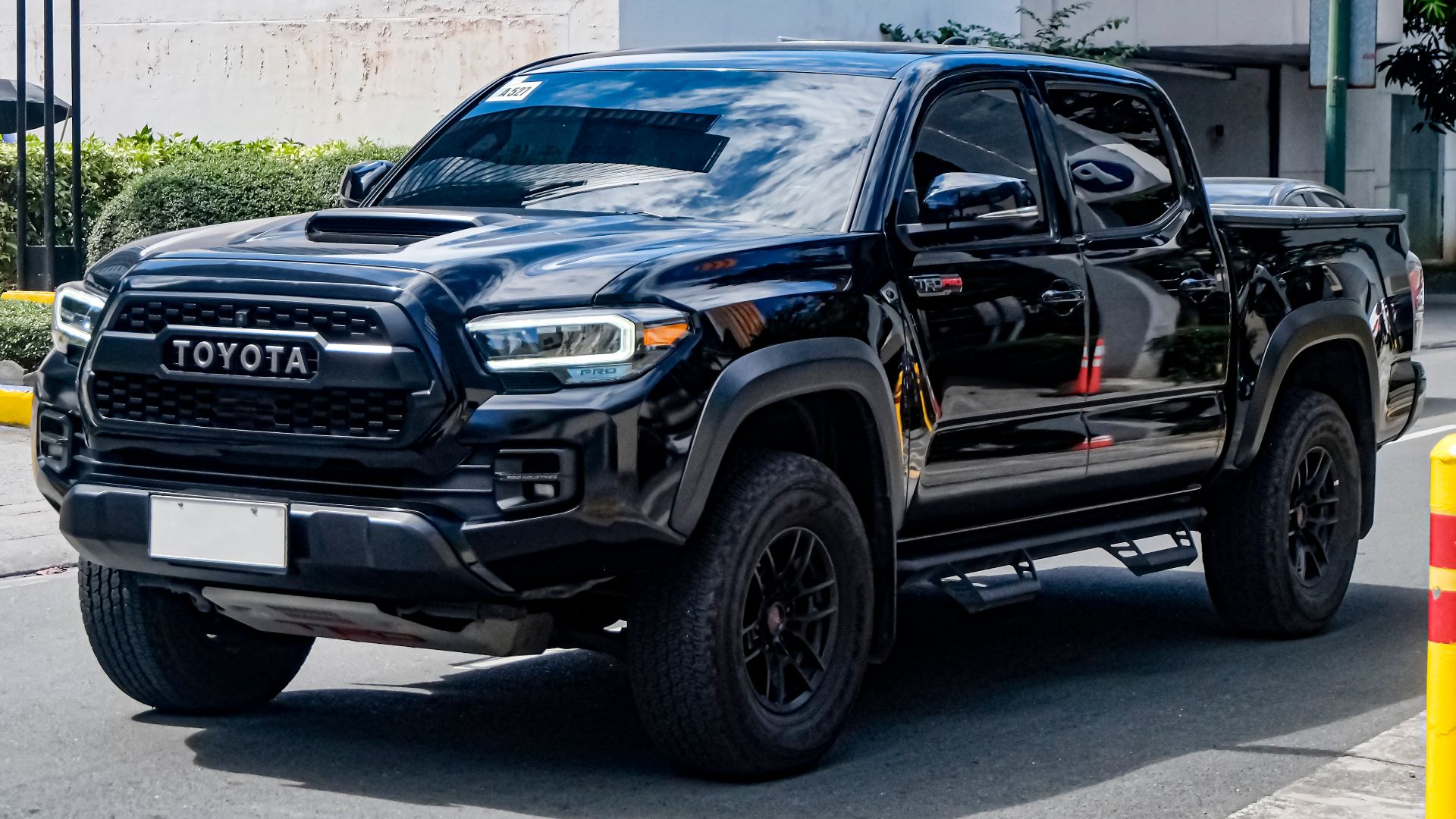 Midnight Black Metallic Toyota Tacoma GRN305L FL 3.5 TRD Pro. US-spec gray import.