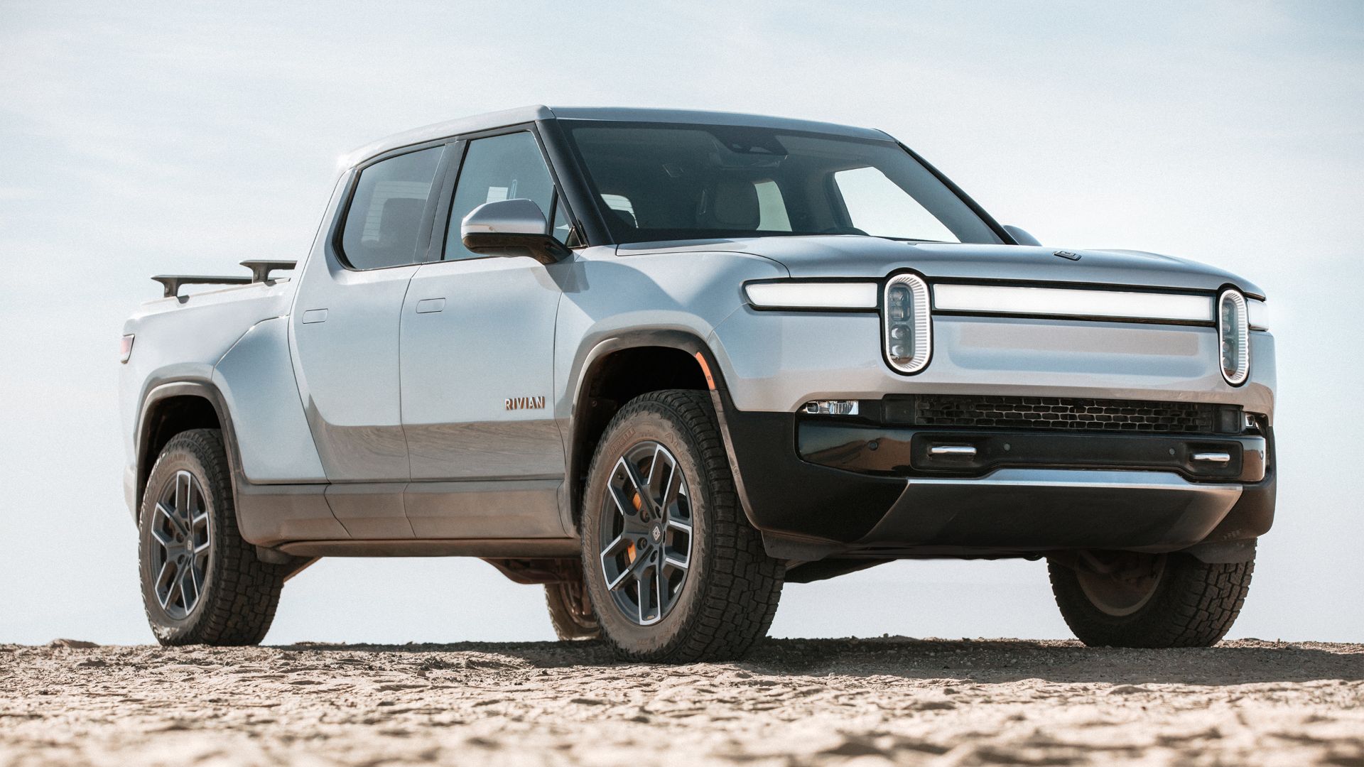 The Rivian R1T, shown here, is the first modern electric pickup to market.
