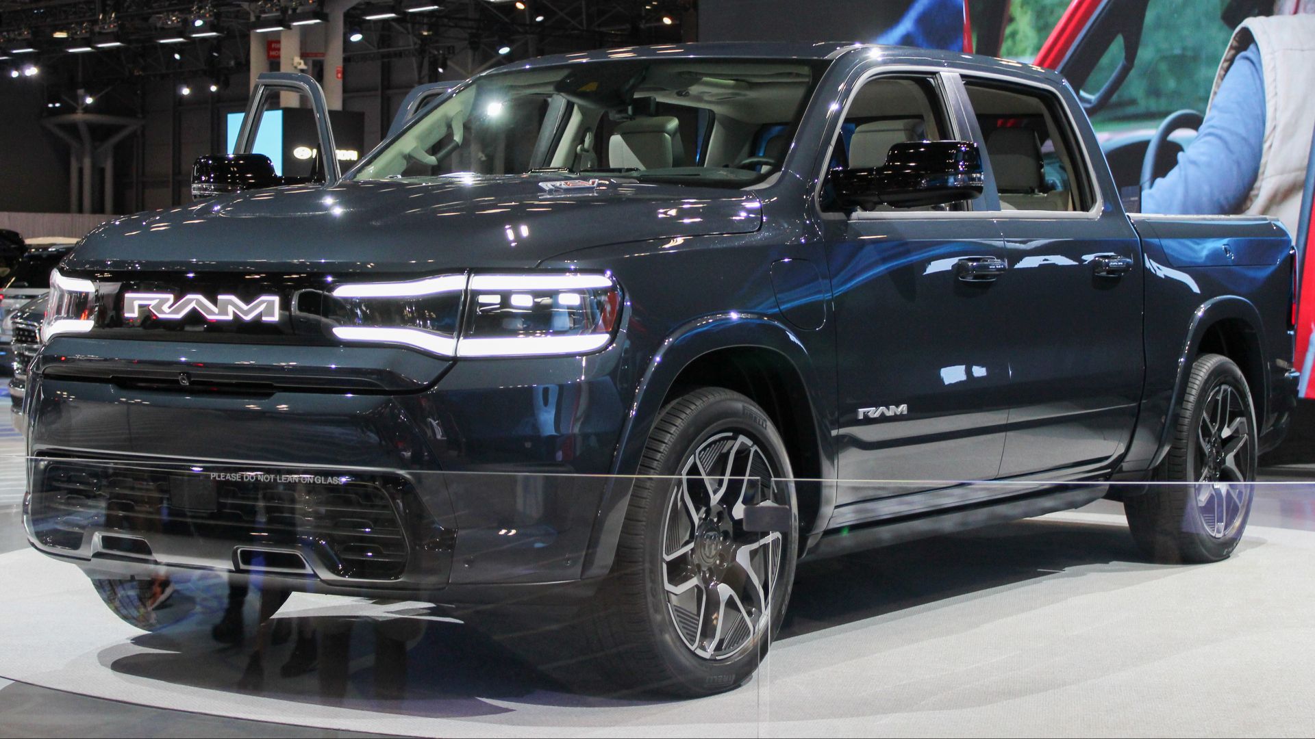 A 2025 RAM 1500 REV photographed during the 2023 New York International Auto Show, inside the Javits Convention Center, at Hudson Yards, New York.