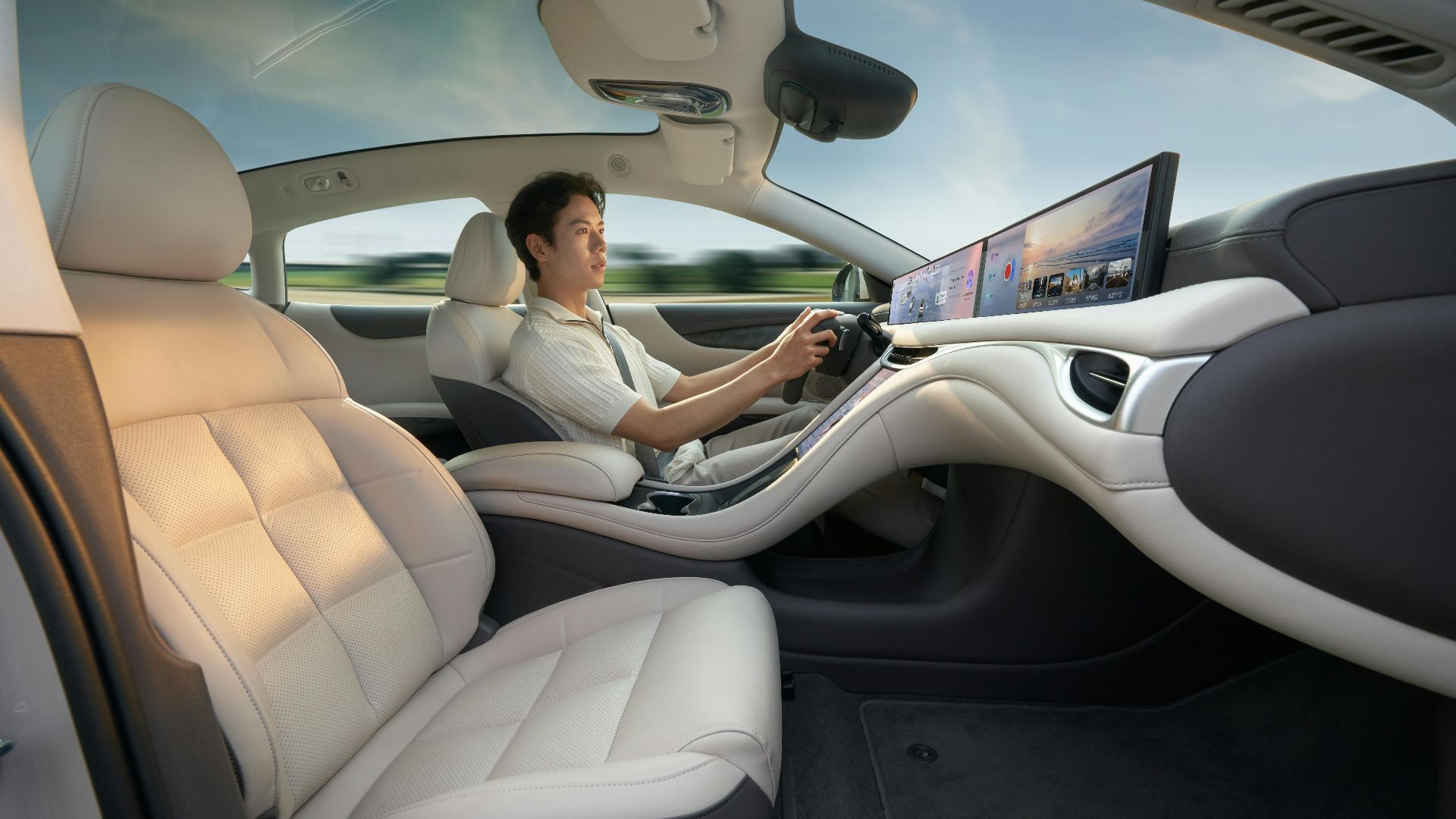 A modern electric car interior showcasing advanced technology with a driver enjoying a smooth ride.