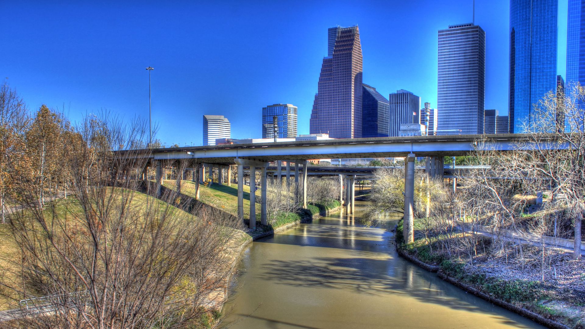 Houston is the largest city in Texas with the six million people in its metro area. Its wide array of parks and attractions make it an attractive city for touri
Houston skyline above the bridge