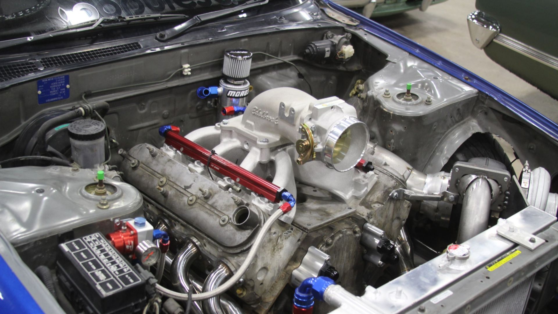 Not your ordinary 1991 Nissan Skyline four door. This one has a General Motors LS-series V8 engine swapped in likely to piss off fan boys on both sides of the fence.