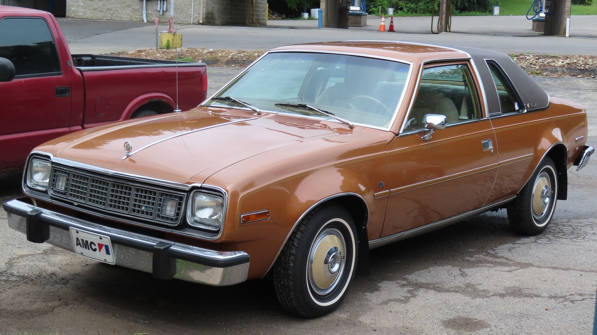 1978 AMC Concord D/L 2-door Sedan photographed in New Castle, Pennsylvania. This one is finished in Golden Ginger and looks to be in nearly pristine shape; I knew I had to pull over for pictures as soon as I saw it from the road.