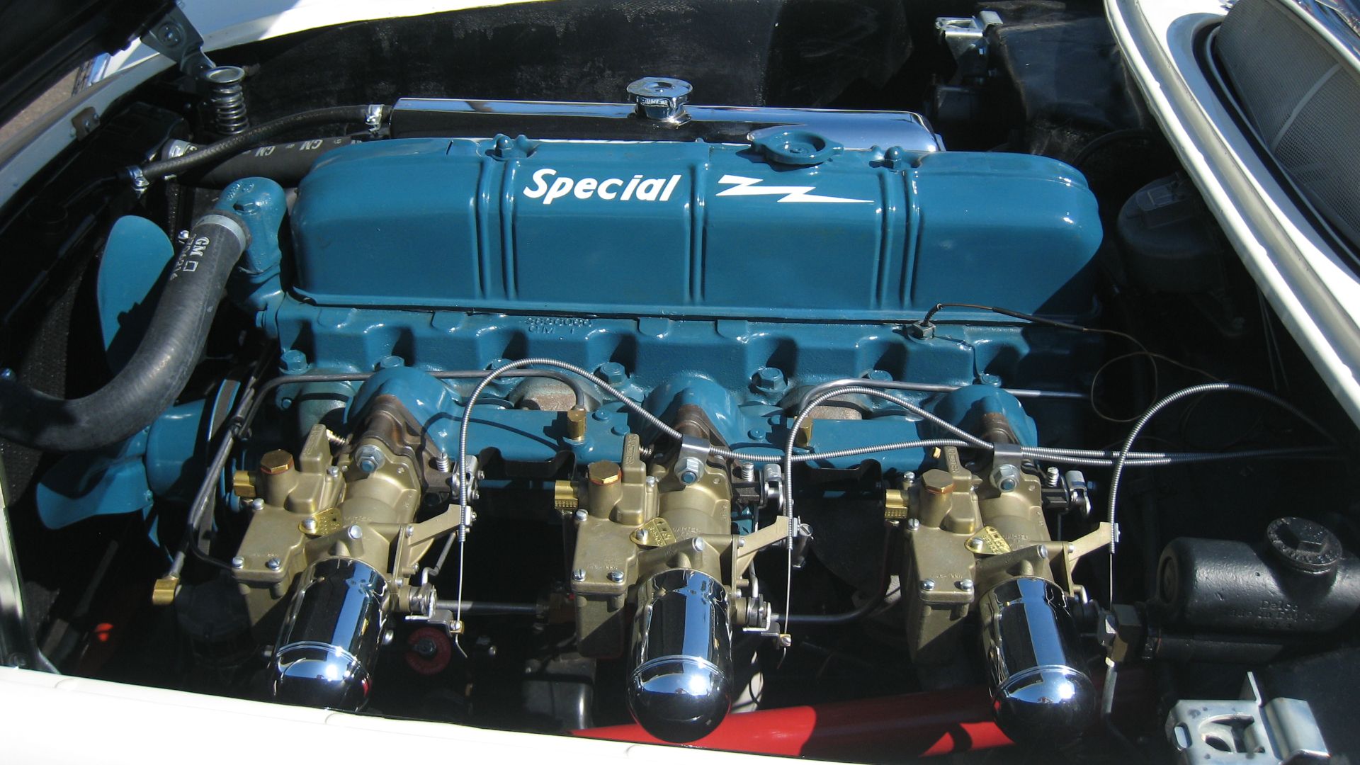 Blue Flame in-line 6 engine on a 1953 Corvette convertible.
I took these pictures at the 2012 National Corvette Restorers Society annual car show. It took place in San Diego, CA this year.

I was told that this particular car was the 13th car rolled off the Corvette production line.