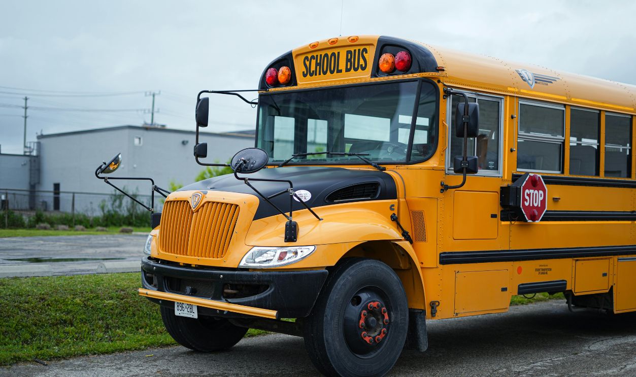 Yellow school bus parked outdoors in Kitchener, Ontario