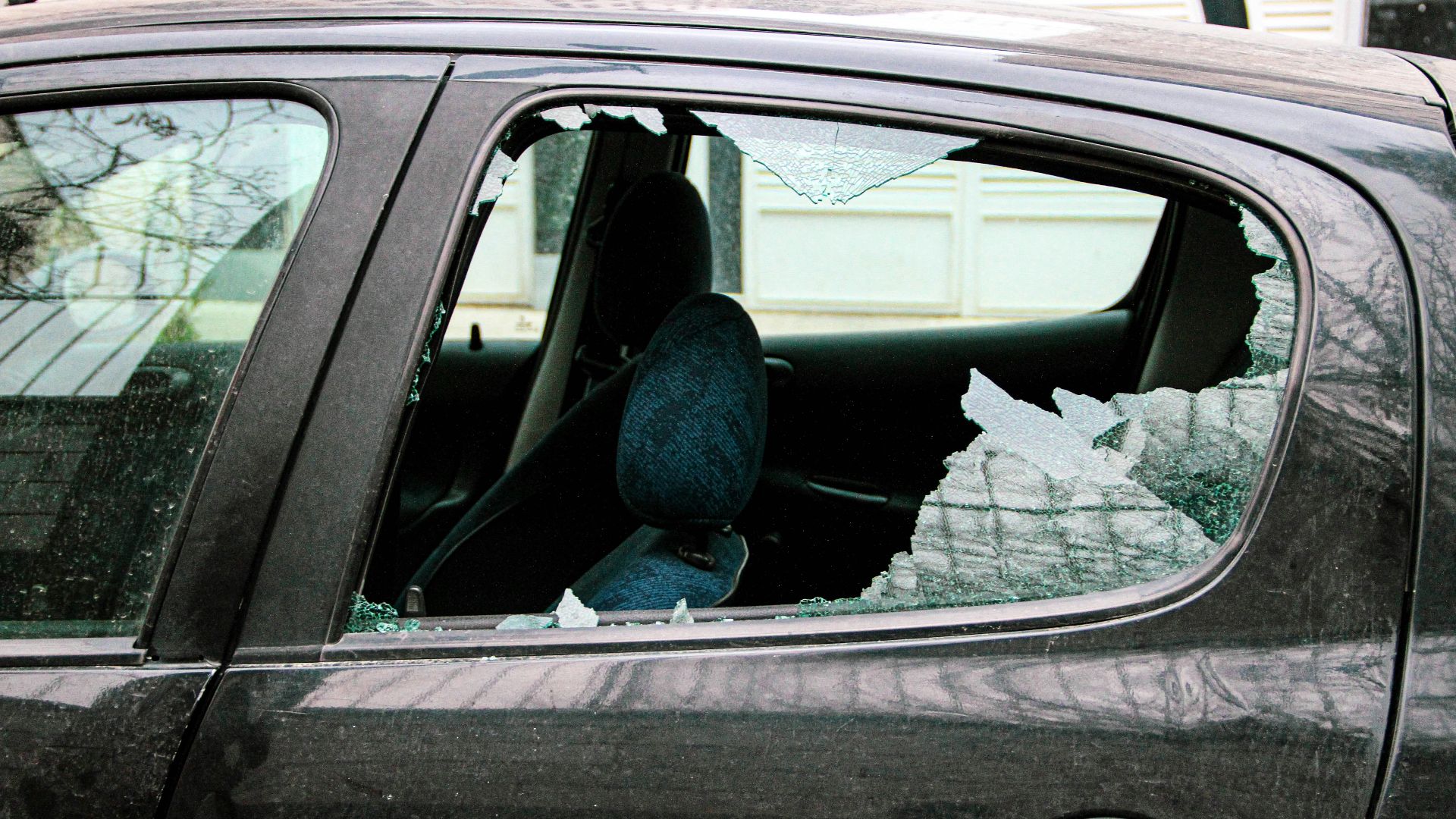 person in blue denim jeans sitting inside car