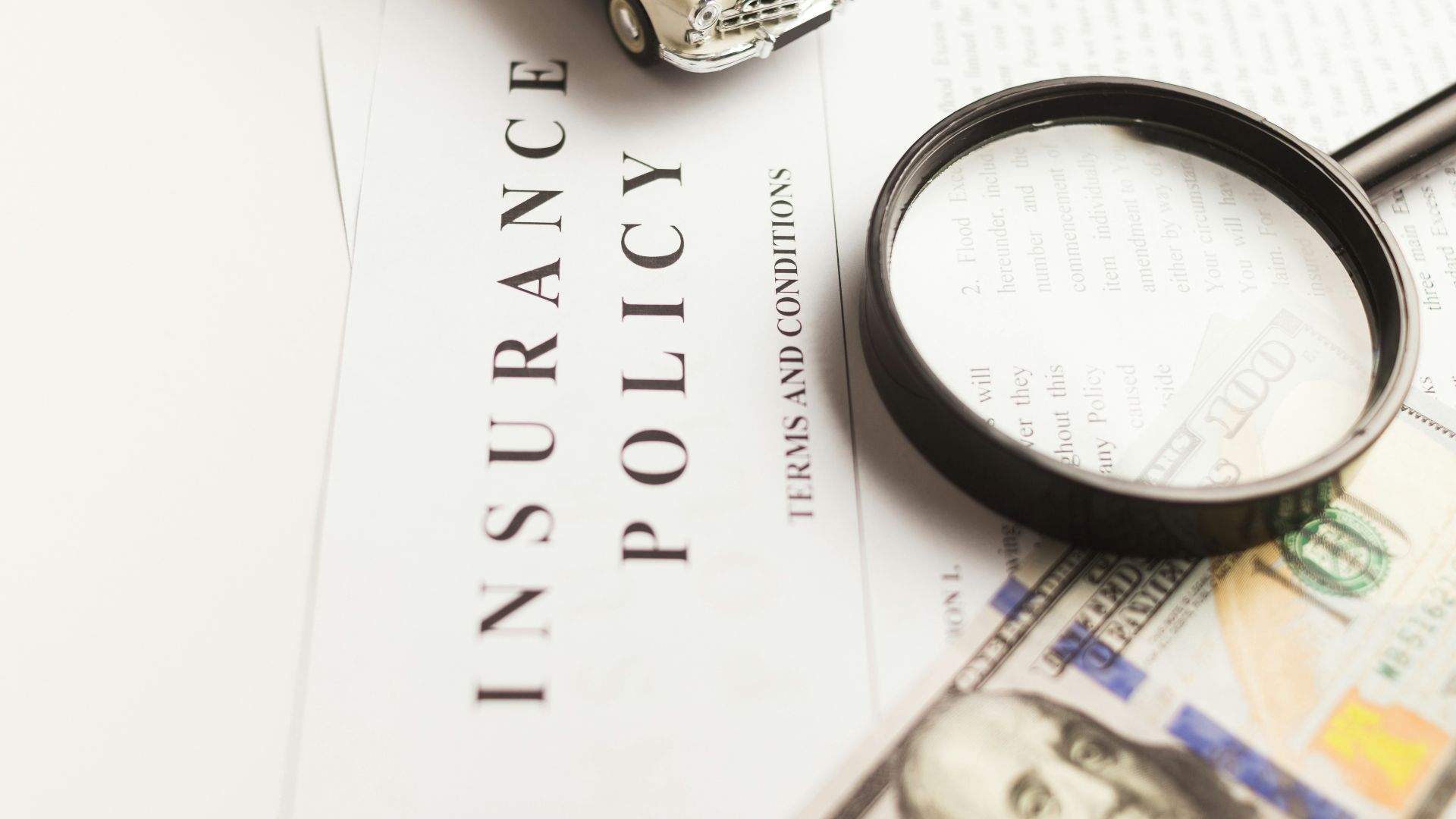 a magnifying glass sitting on top of a piece of paper