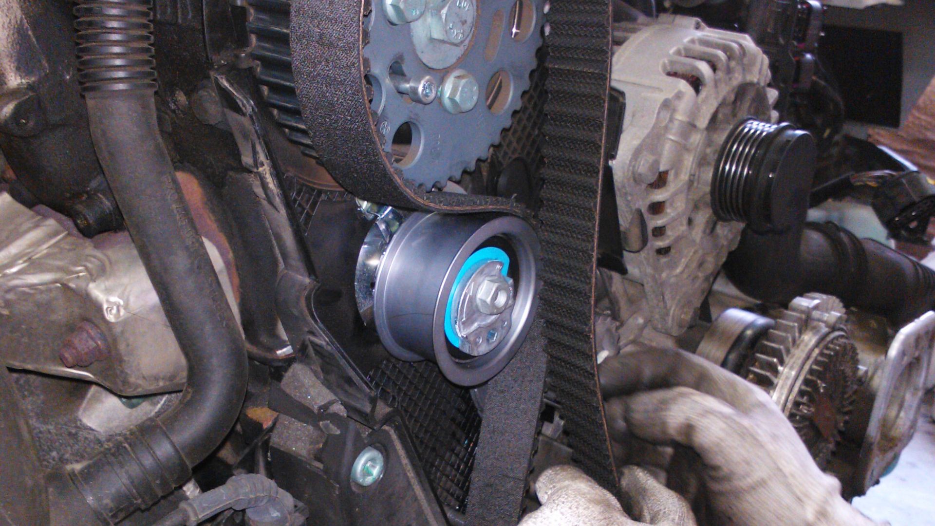 Replacing a timing belt of car.