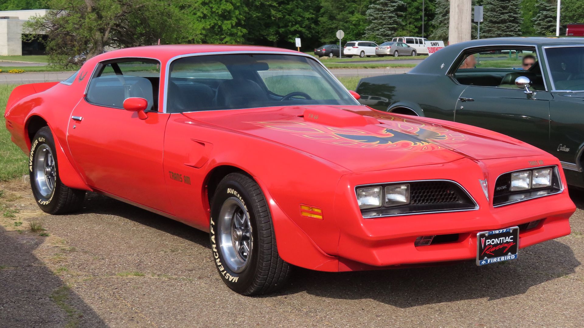 1977 Pontiac Firebird Trans Am photographed at a car show in New Castle, Pennsylvania. Finished in Buccaneer Red.