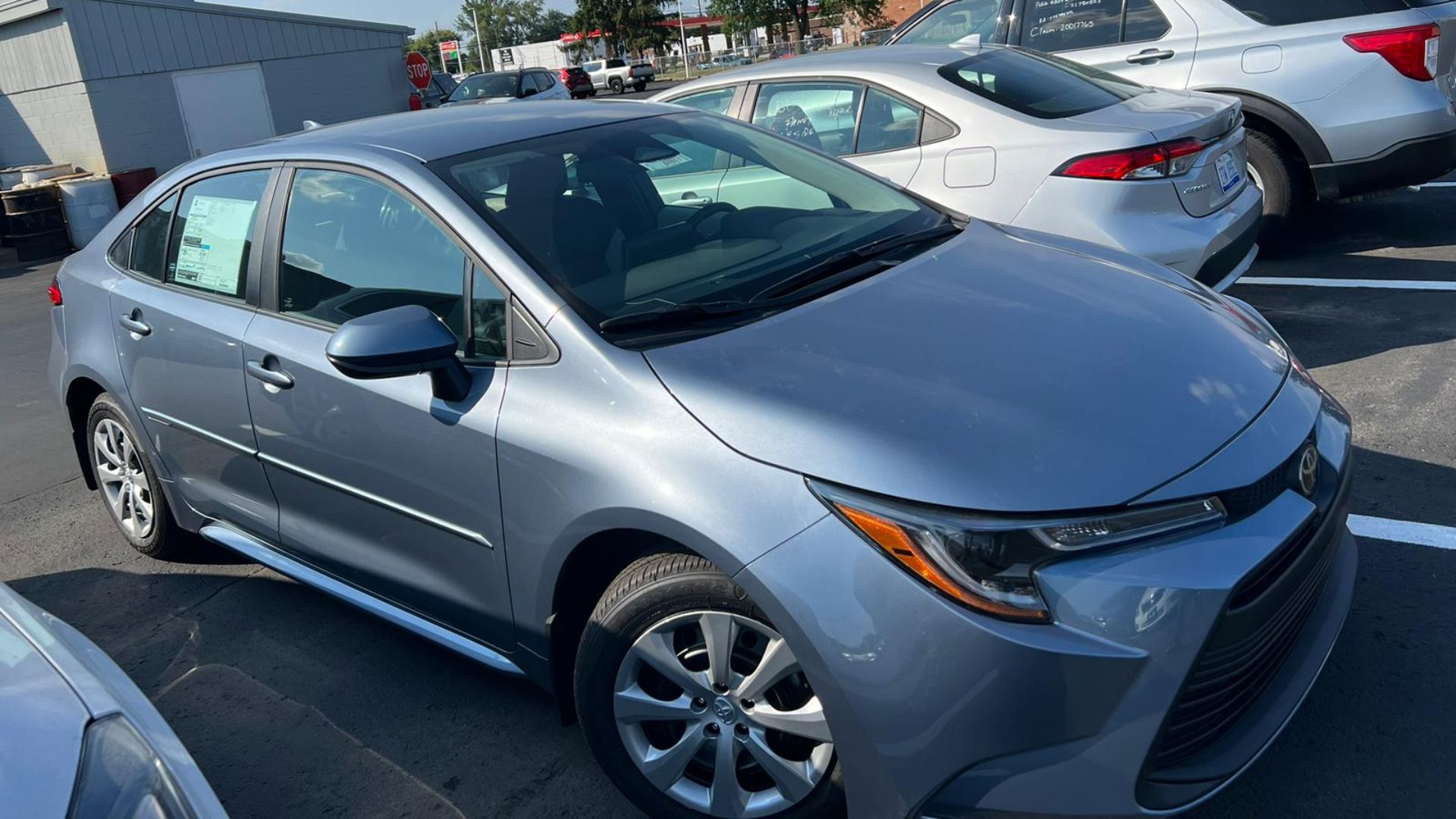 This is a picture of my 2024 Toyota Corolla LE in celestite grey colour that was taken by myself before accepting the delivery. I'm uploading this picture bcoz I want to update the current picture on the wikipedia page of Toyota Corolla which shows an 201