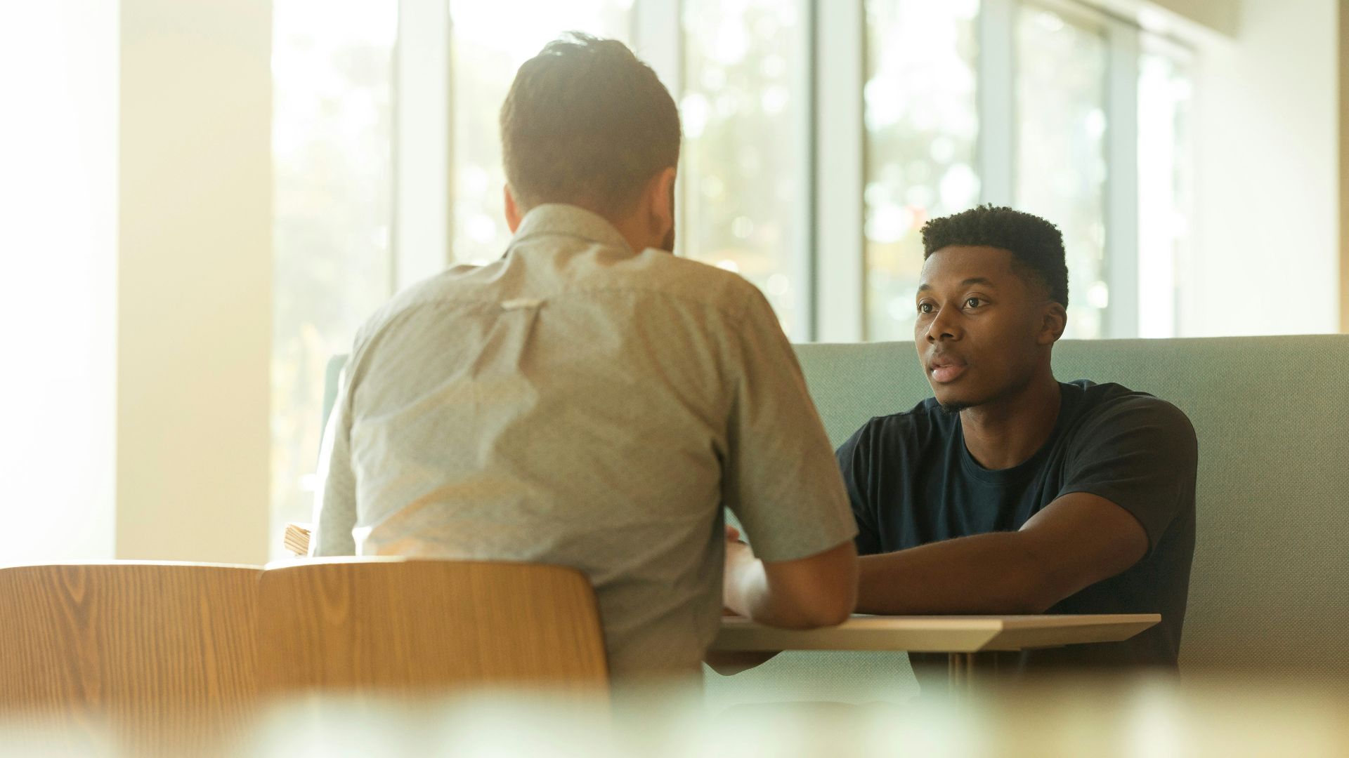 two men talking