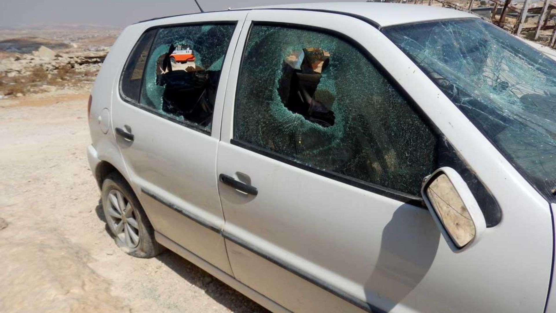car damaged  from settlers attack on Al Mufakara, October 2021