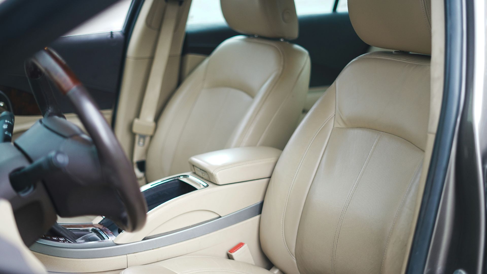 the interior of a car with a steering wheel