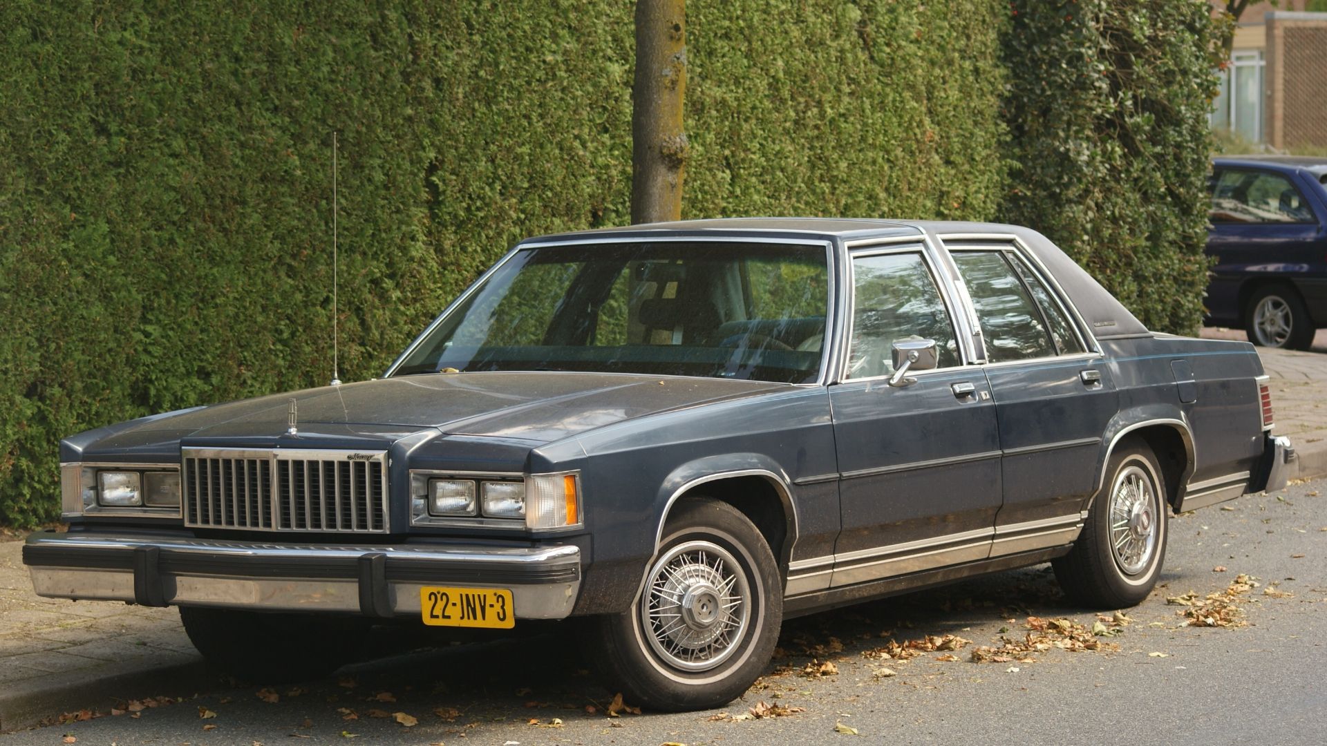 A 1985 Mercury Grand Marquis four-door sedan located in Ede, Netherlands.