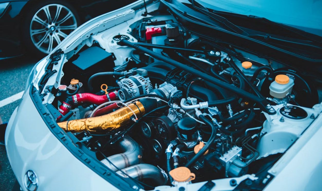blue and white car engine bay
