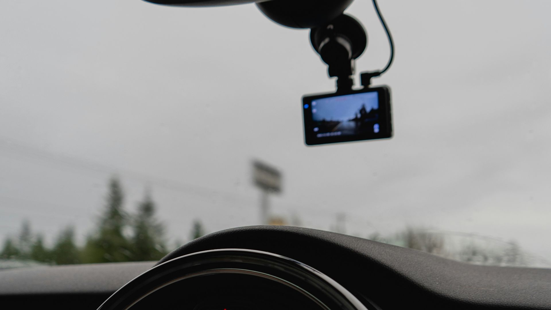 the dashboard of a car with a gps device