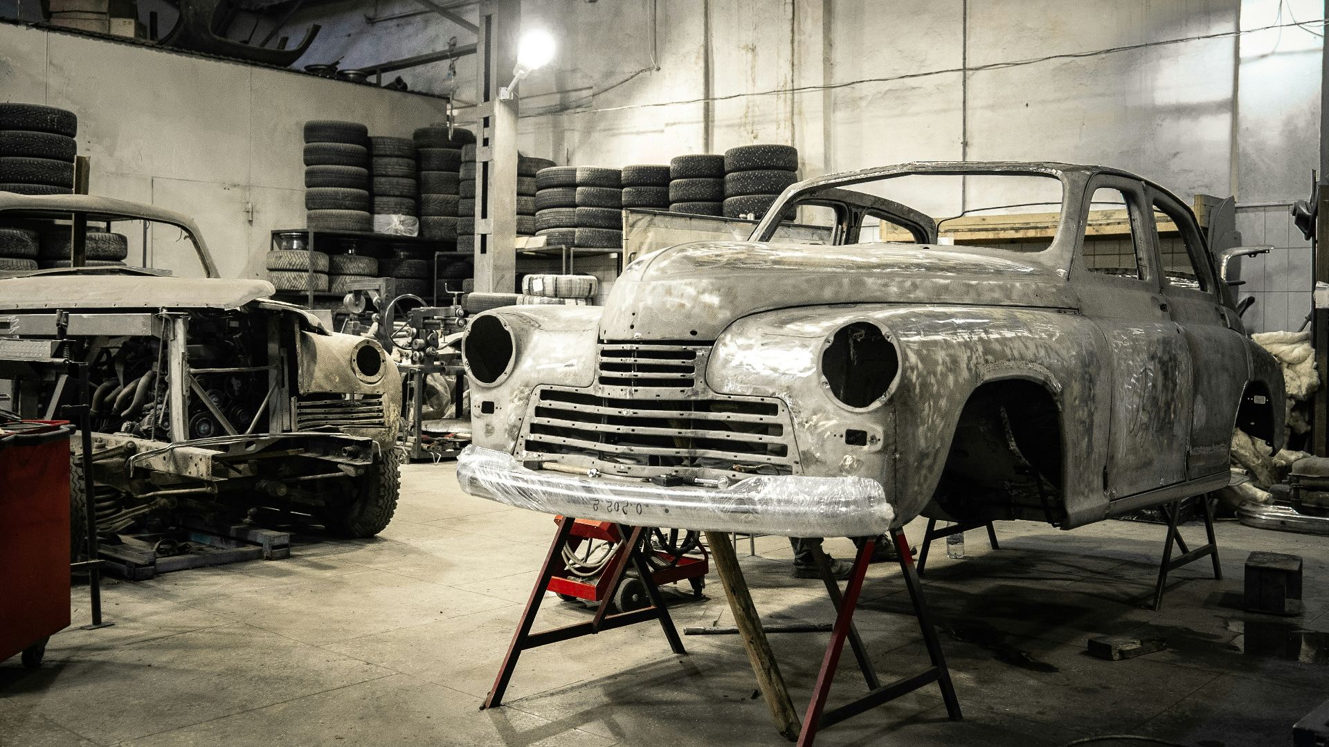 white vintage car in garage