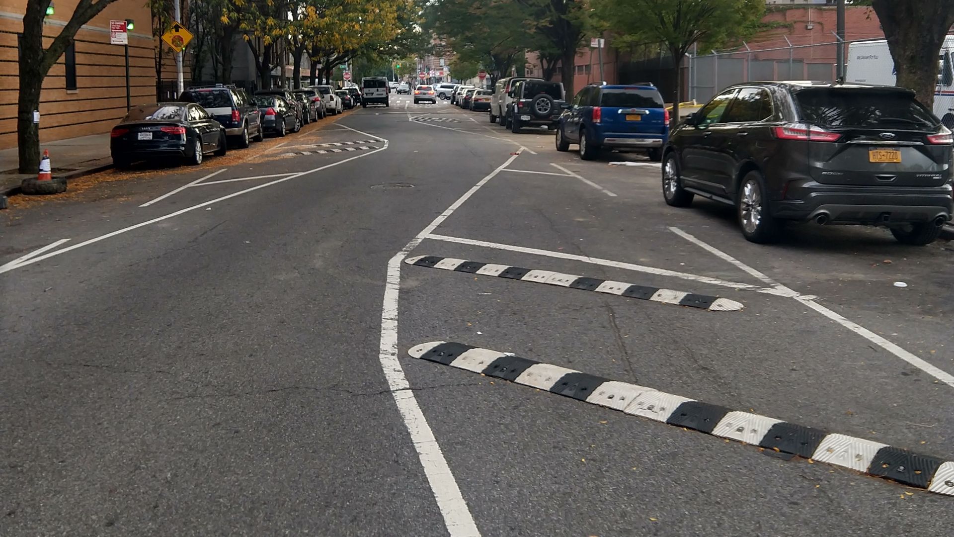 Traffic-calming chicane.  Washington Avenue between E 188th and E 189th streets, Bronx, New York.  Looking south.