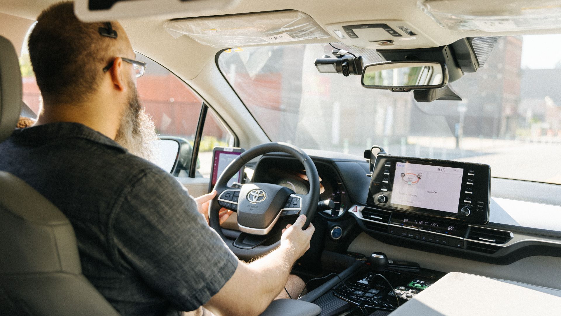 Interior of a May Mobility autonomous Toyota Sienna, with a safety driver, in Detroit