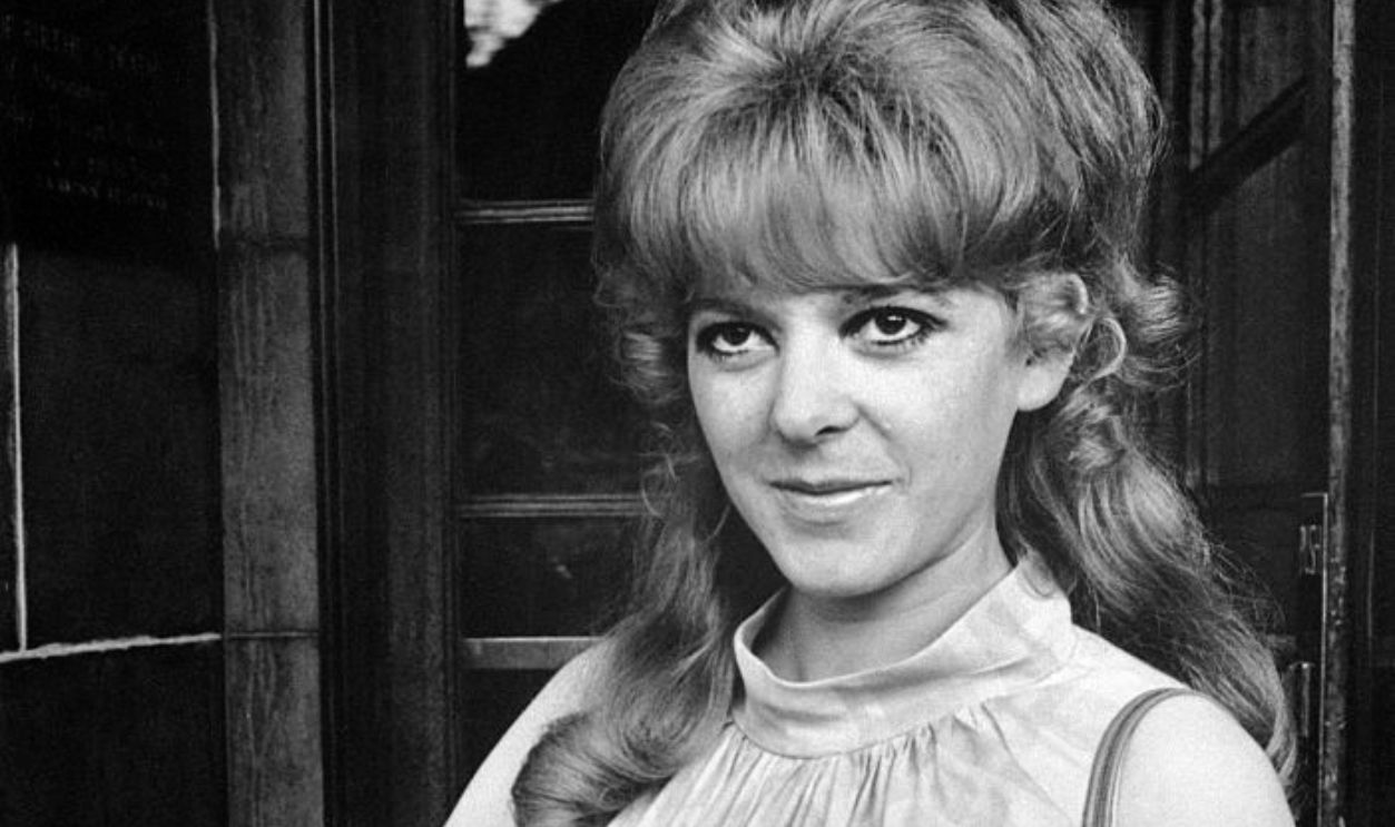 (Original Caption) Ringo's new son...Maureen Starkey, wife of Ringo Starr, drummer of the Beatles, and her recently-born son, Jason, leave Queen Charlotte's Hospital. The baby, the couple's second son, was born at the hospital on August 19th.