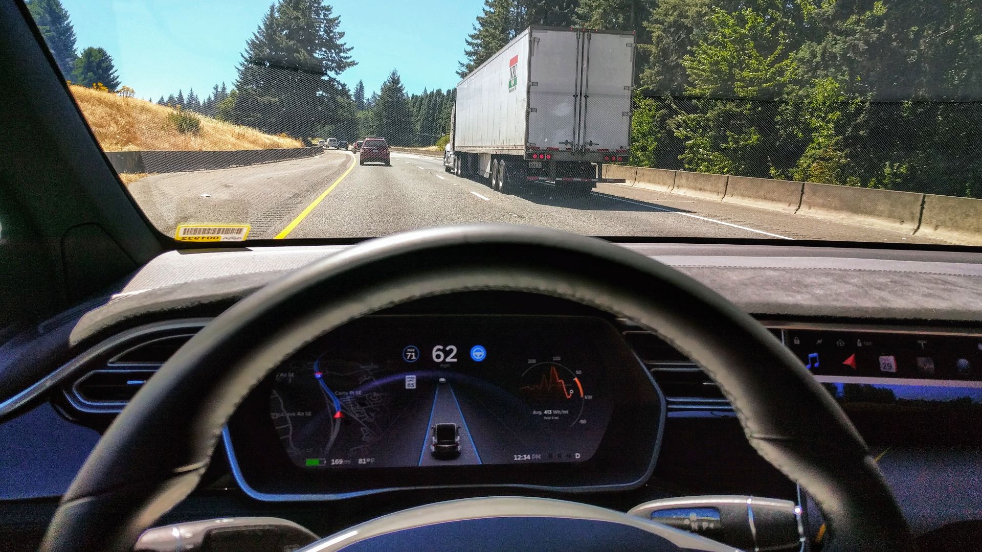 Driving in traffic with Tesla's autopilot controlling distance from the lead car and centering the vehicle in the lane.
Vehicle is a 2017 Model X 75D with dark interior.