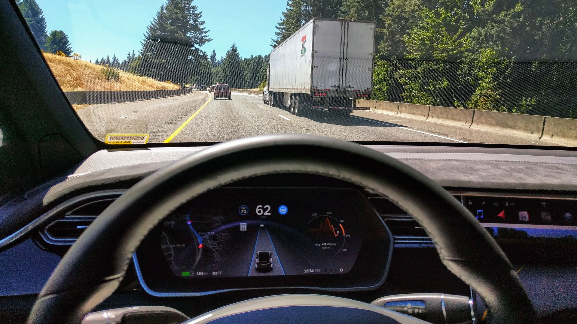 Driving in traffic with Tesla's autopilot controlling distance from the lead car and centering the vehicle in the lane.
Vehicle is a 2017 Model X 75D with dark interior.