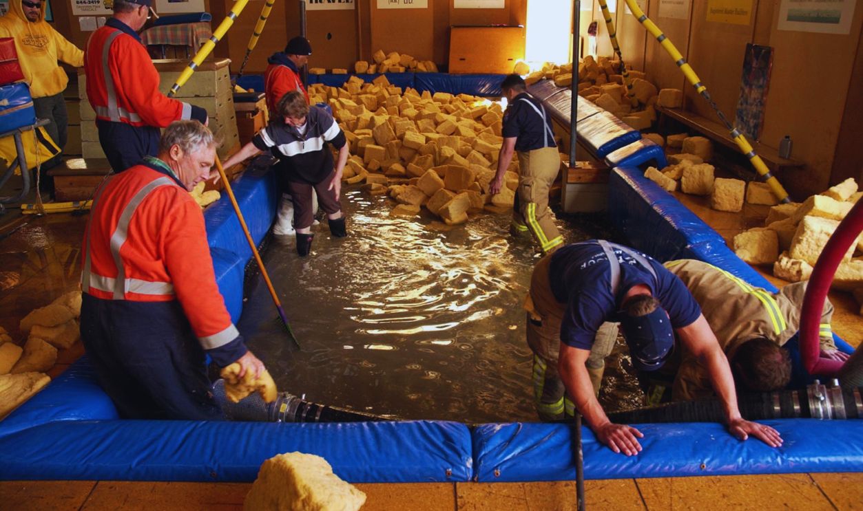 Gettyimages - 55803020, Fire crews and volunteers try to clean up the Omni